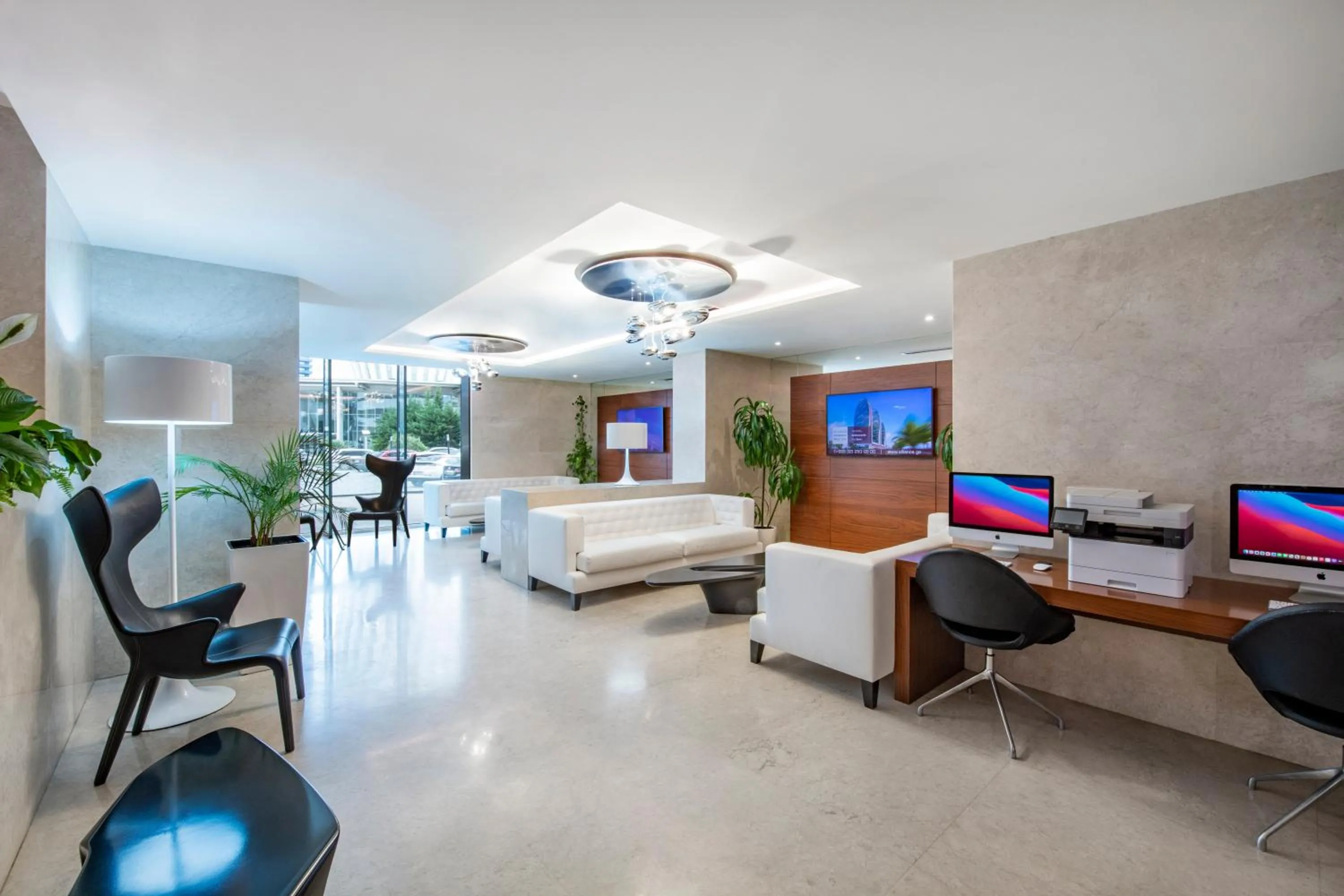 Communal lounge/ TV room in Alliance Palace Batumi