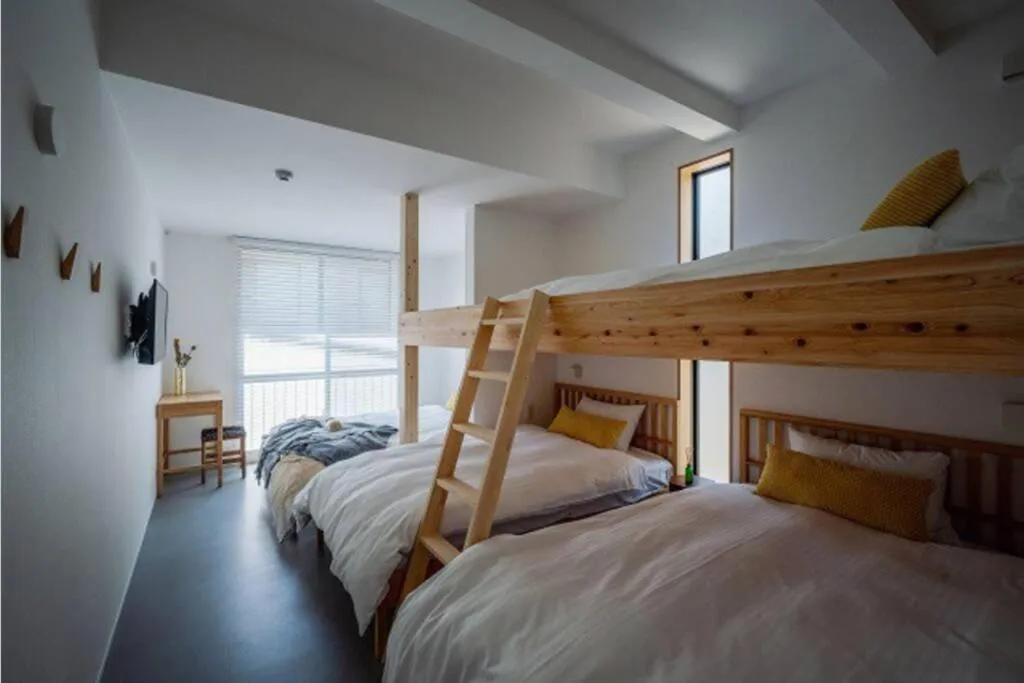 Bed in HOUS-AGALonomichi