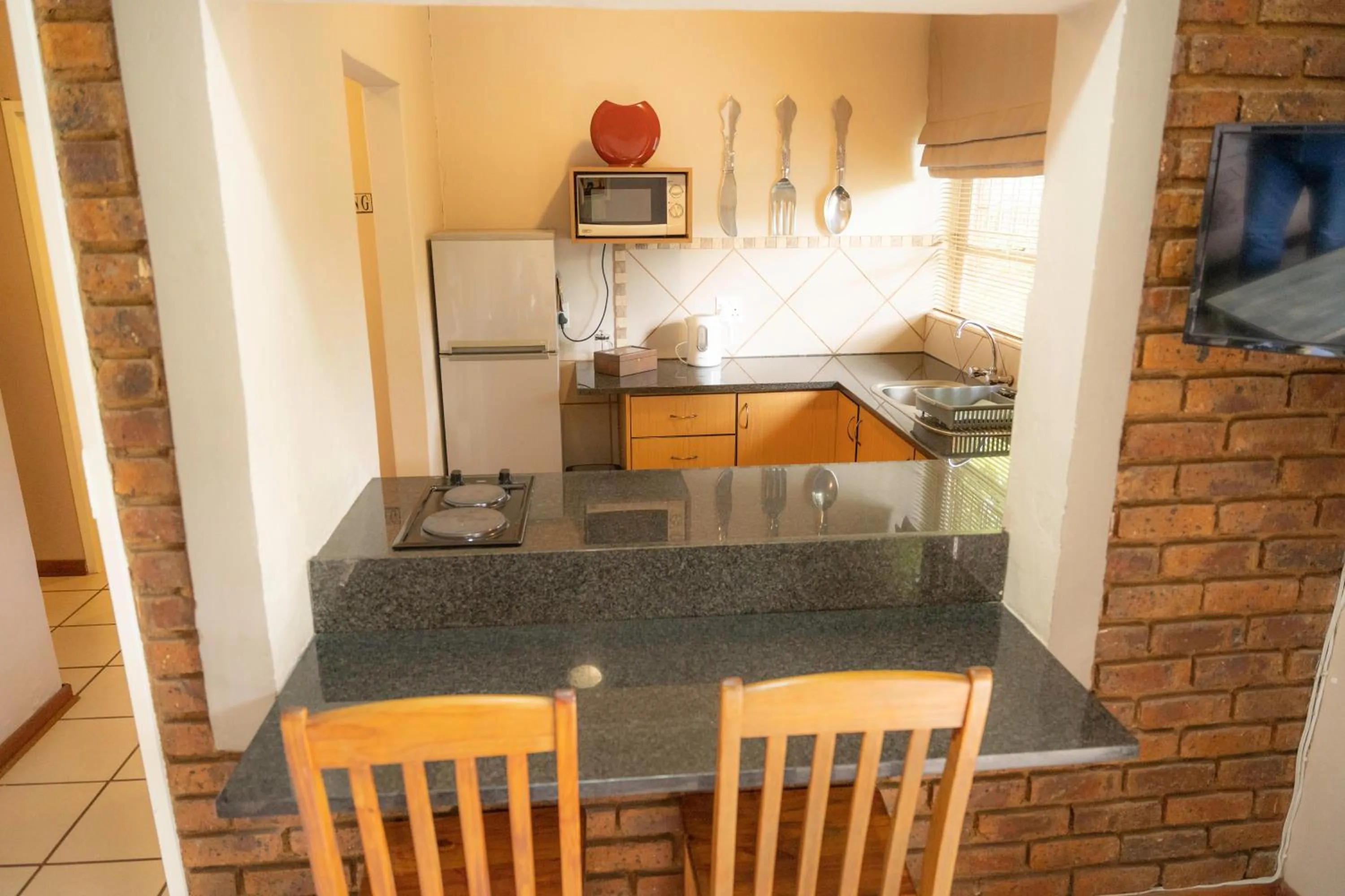 Kitchen or kitchenette in L'anda Guesthouse & self catering