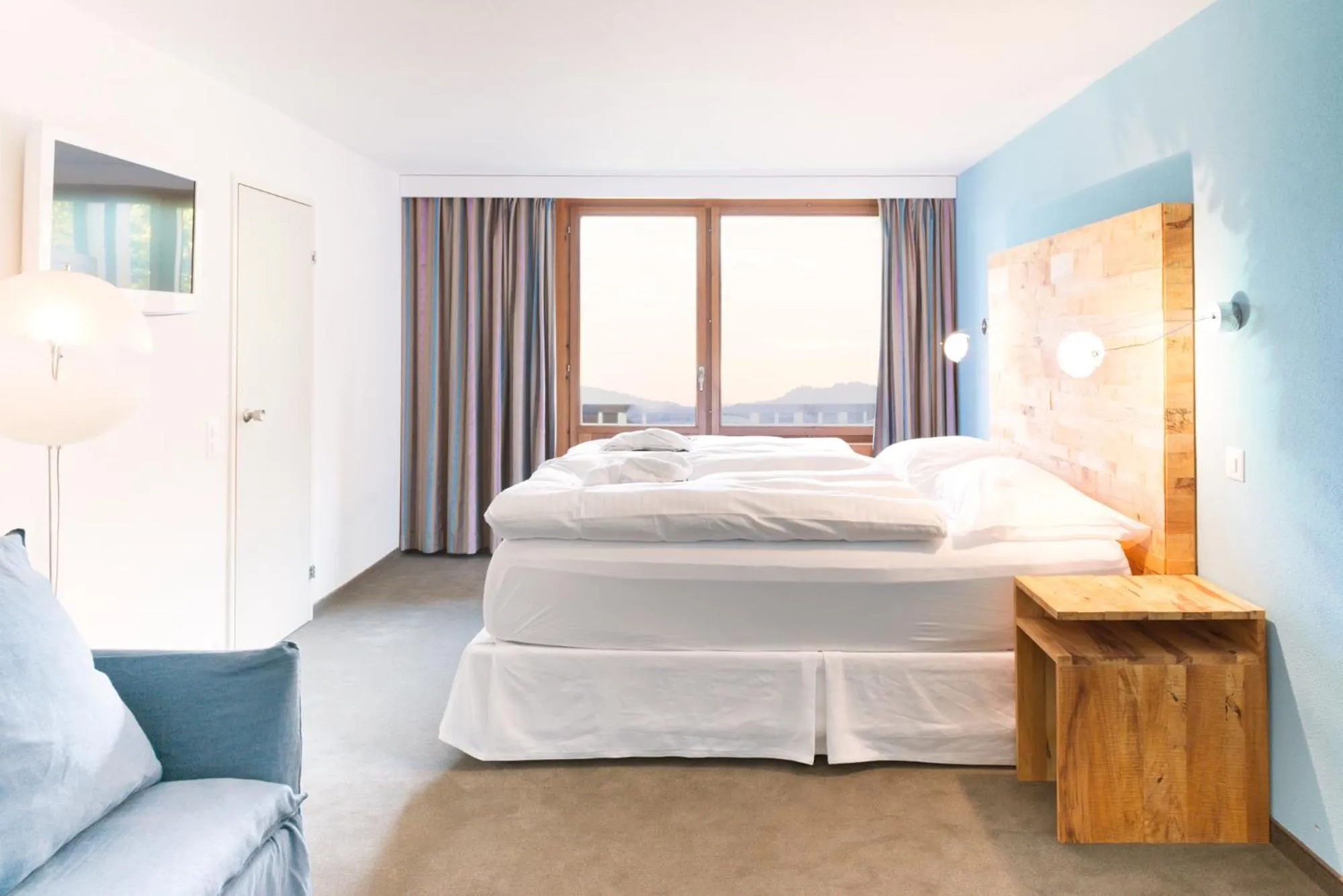 Photo of the whole room, Bed in Wellness Hotel Stoos