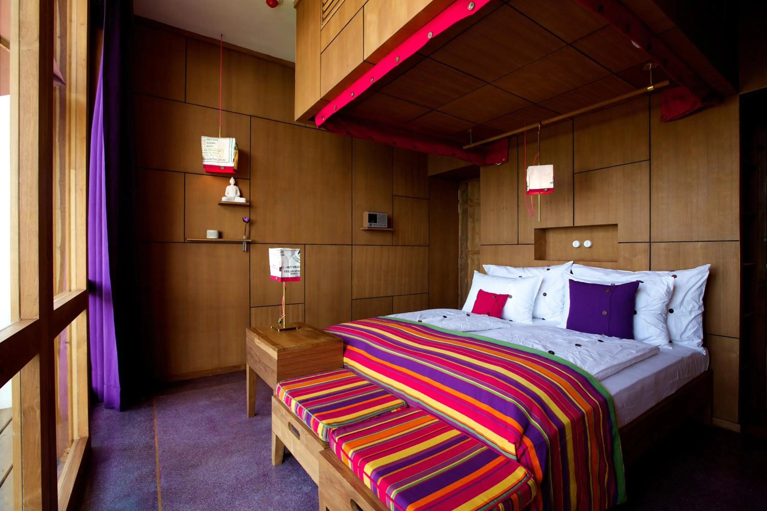 Bed in UTMT - Underneath The Mango Tree Spa & Beach Resort