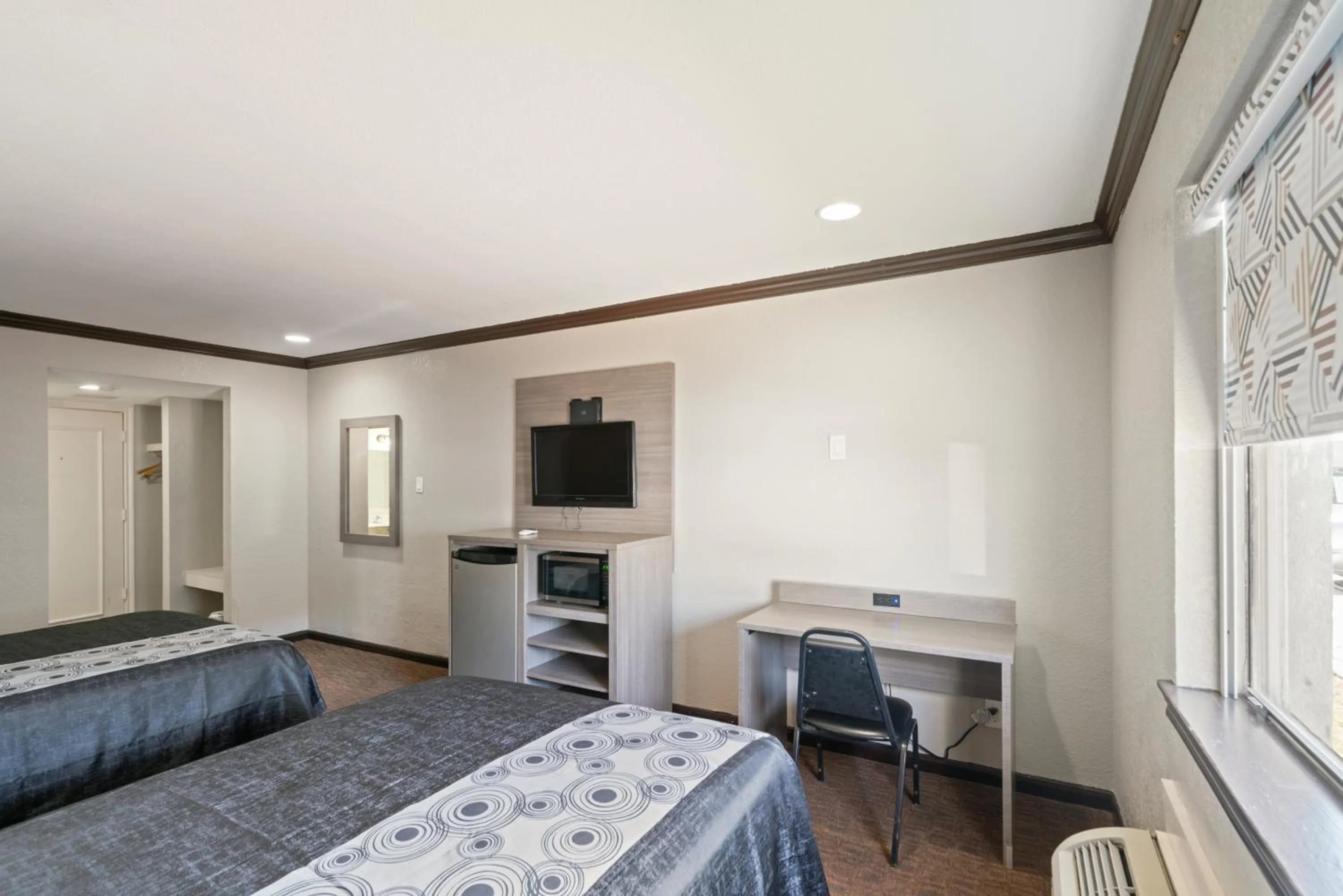 Bed in Americas Best Value Inn & Suites Brenham