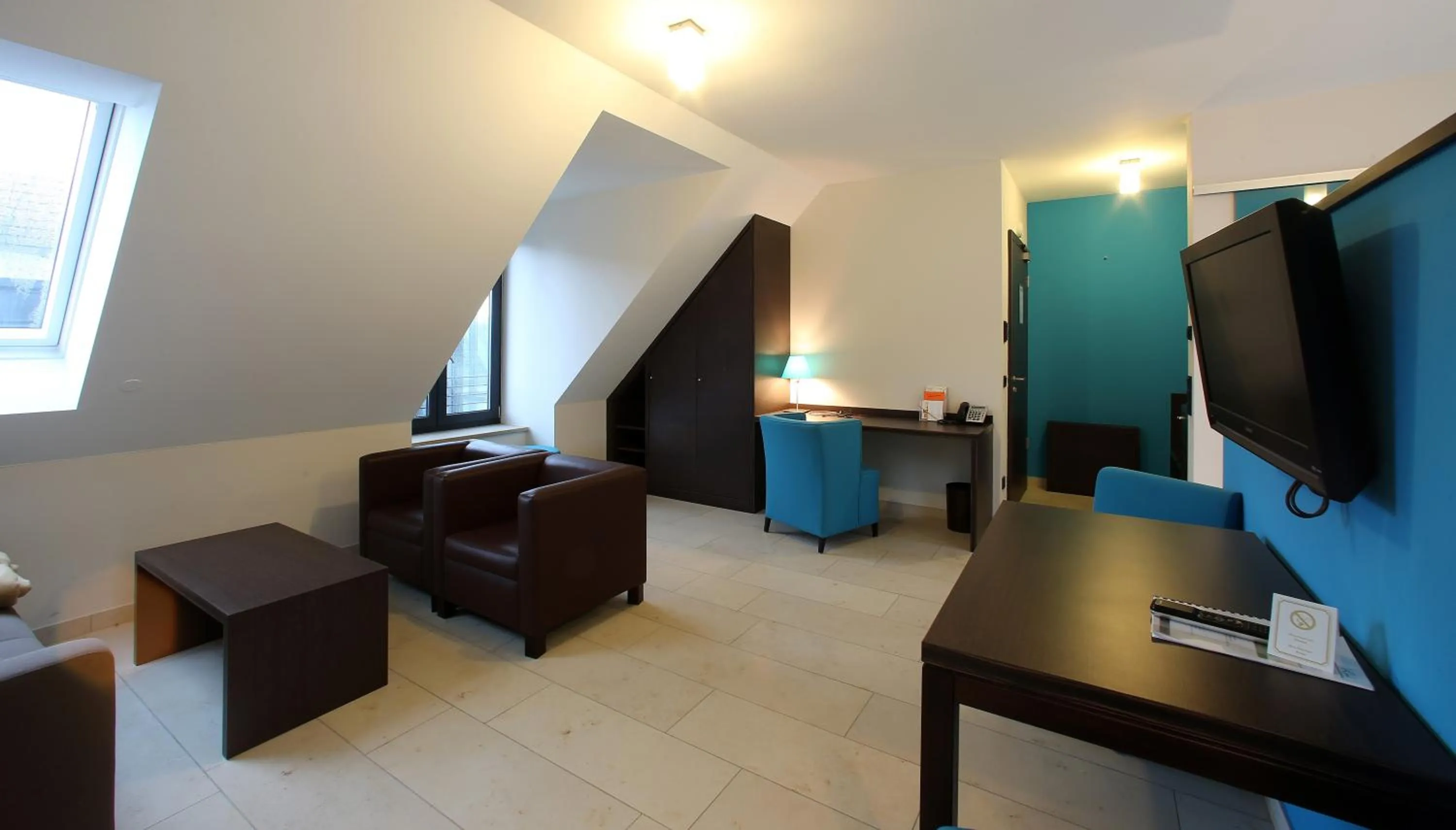 Seating area in KH Hotel mit Restaurant