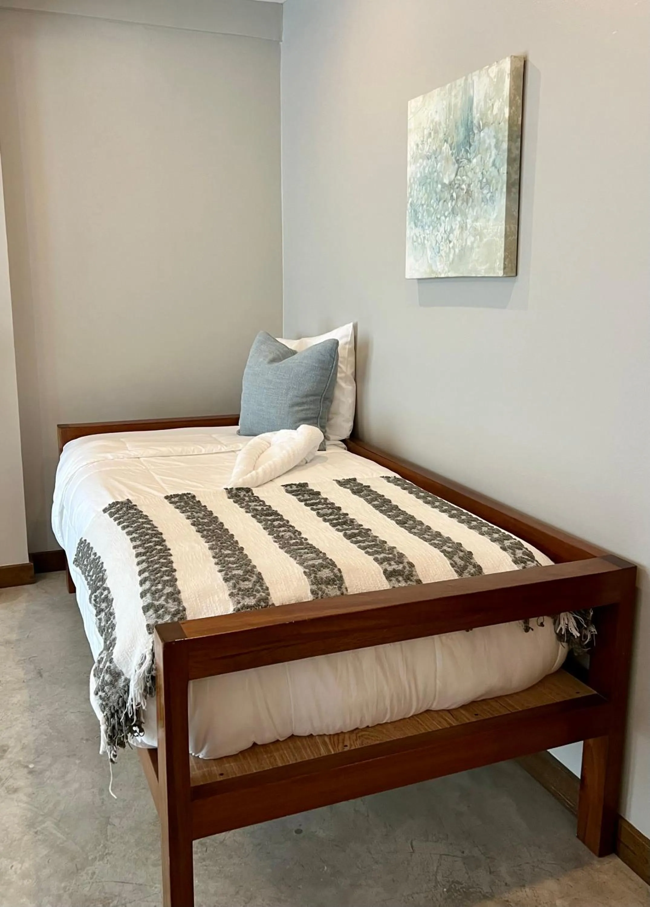 Bed in Mata Rocks Resort