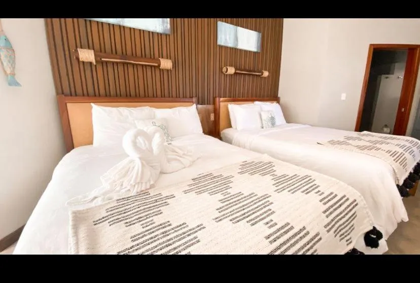 Bed in Mata Rocks Resort