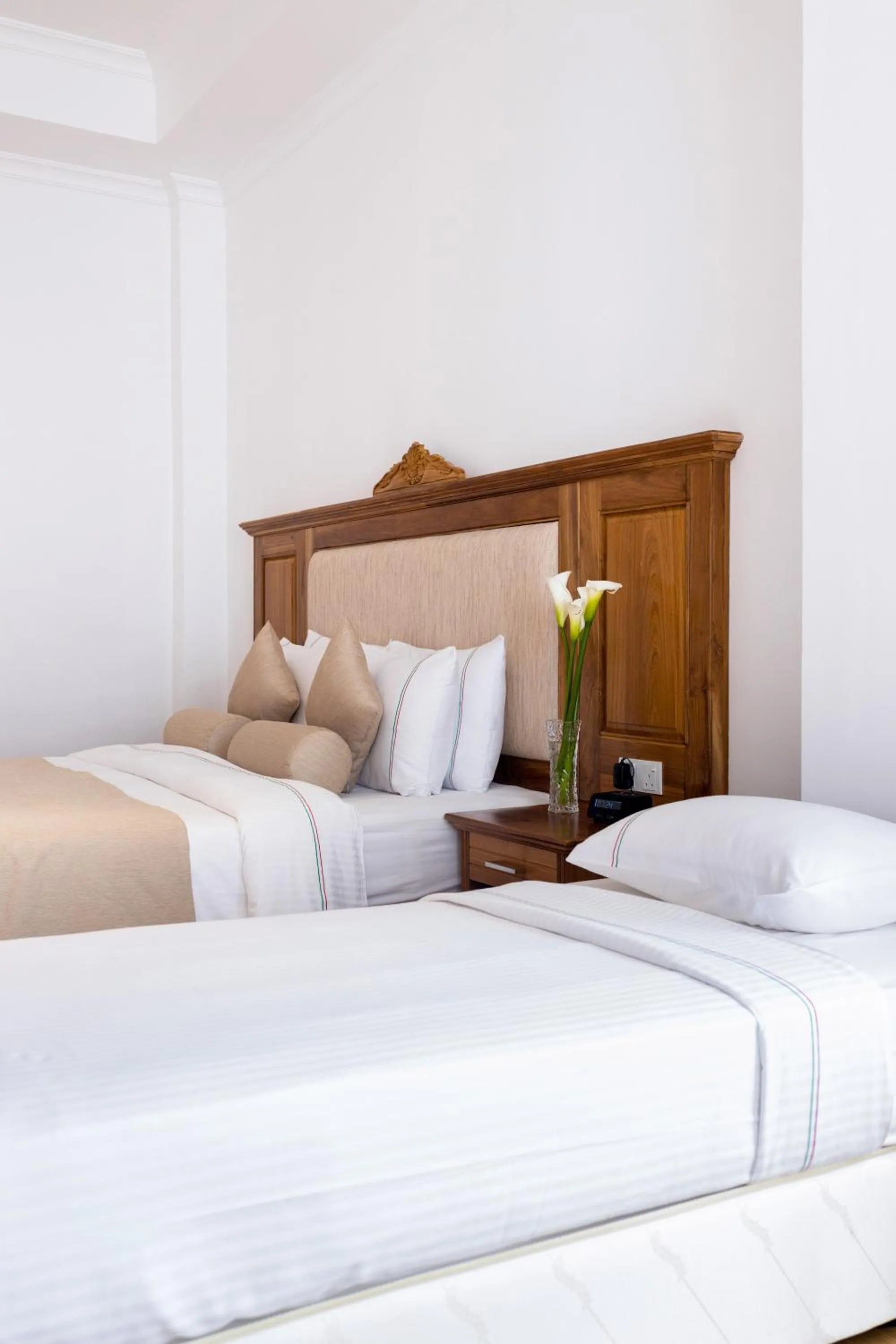 Bed in Araliya Red - Budget friendly Hotel- Where you find stunning 360 panoramic view of Nuwara Eliya