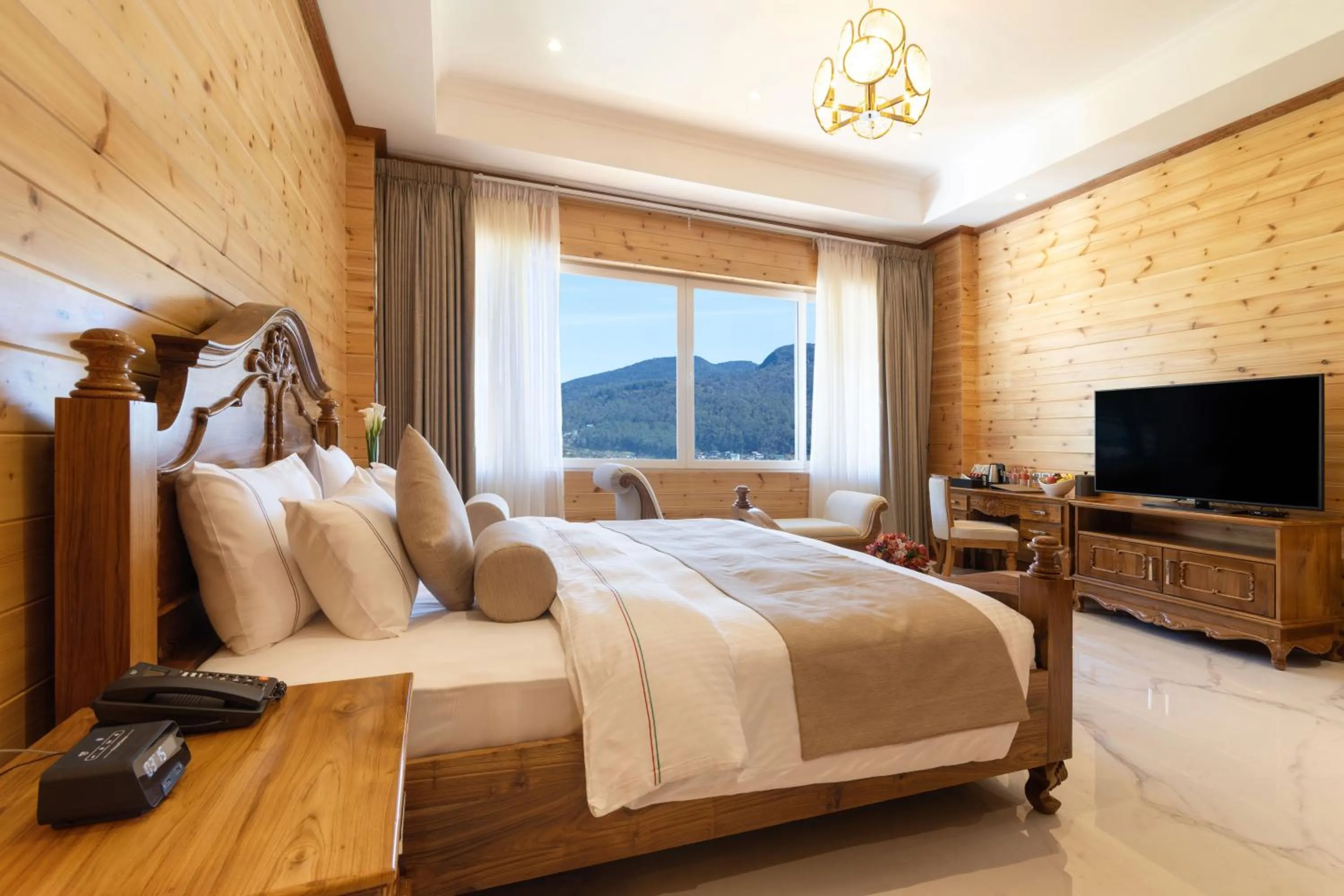 Bed in Araliya Red - Budget friendly Hotel- Where you find stunning 360 panoramic view of Nuwara Eliya