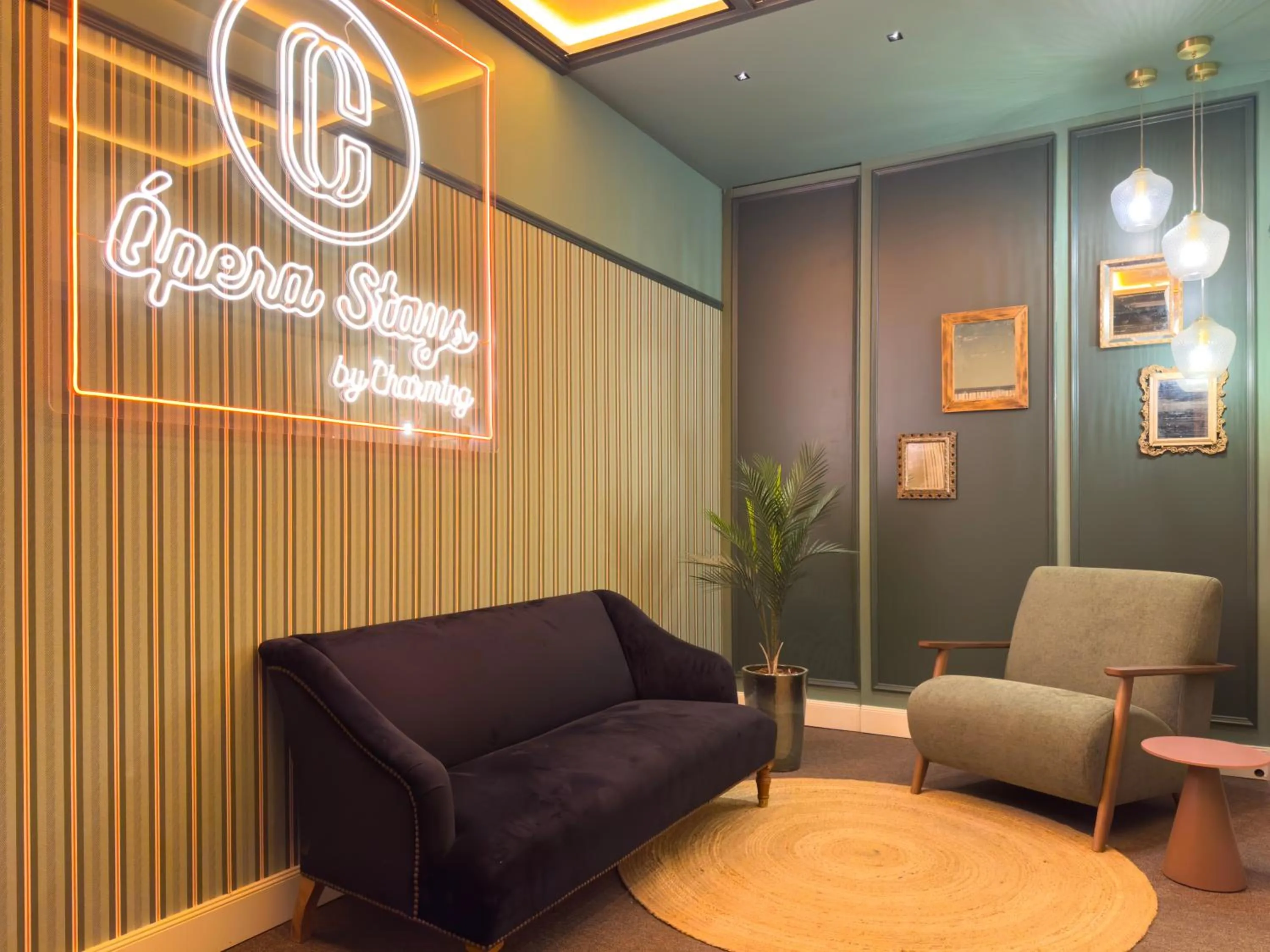 Property logo or sign in Ópera Stays by Charming