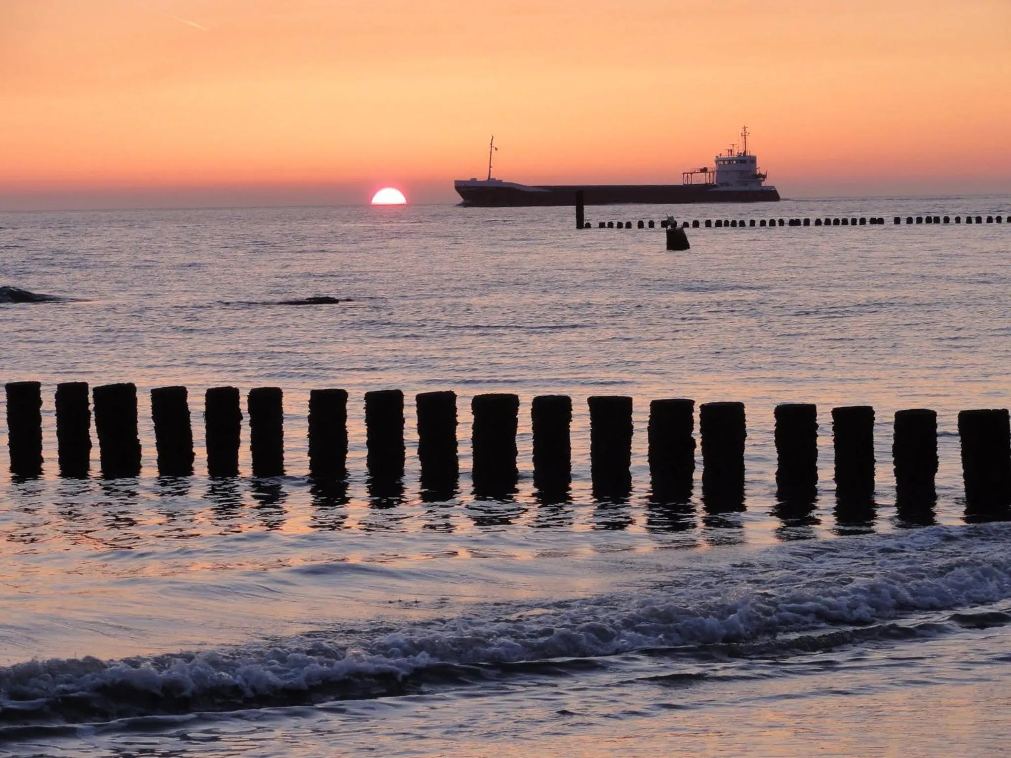 Sunset in bed bij zee