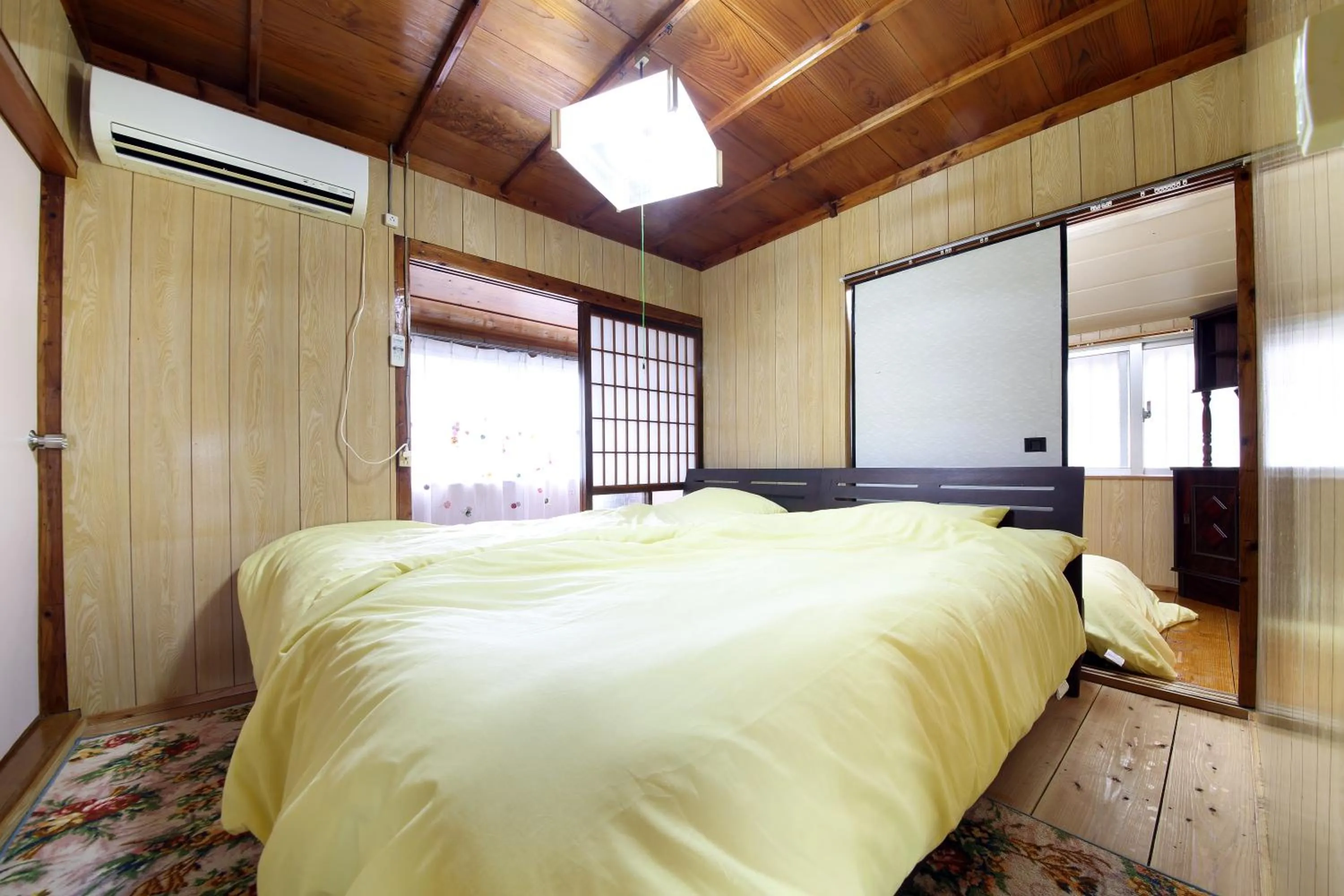Bed in Kume Azuma Villa