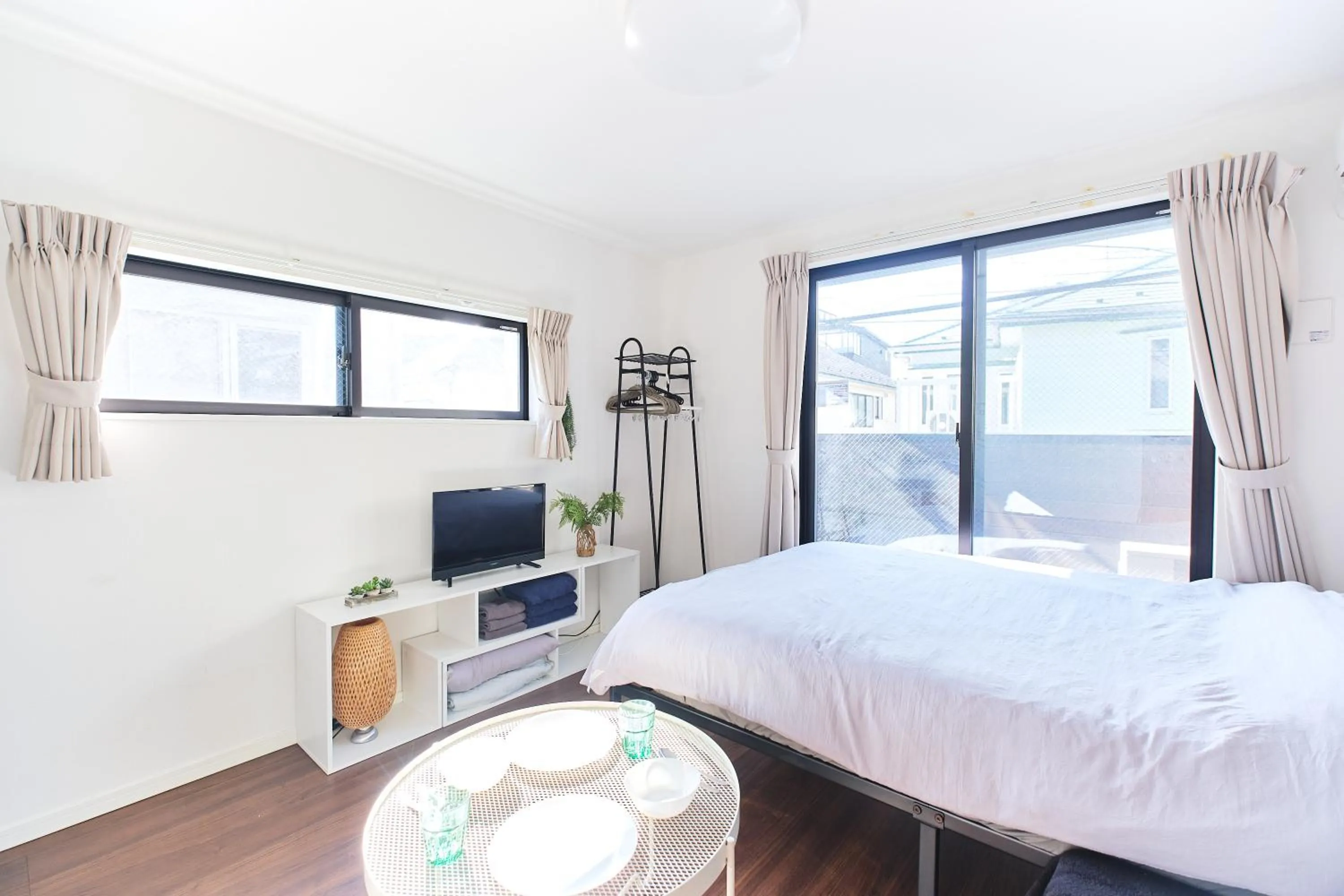 Bed in Base Hanegi Apartment by Tranova