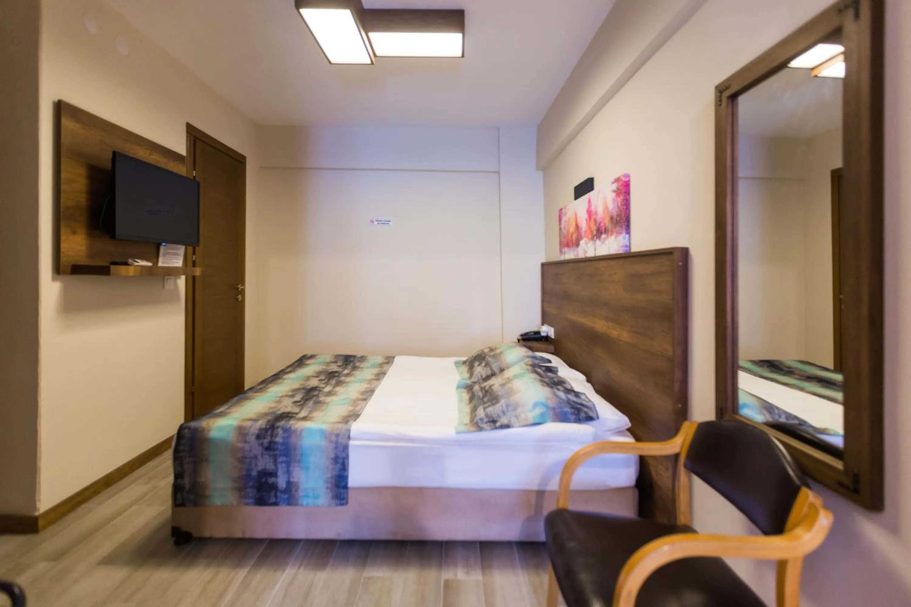 Bed in OLD TOWN BOUTIQUE HOTEL