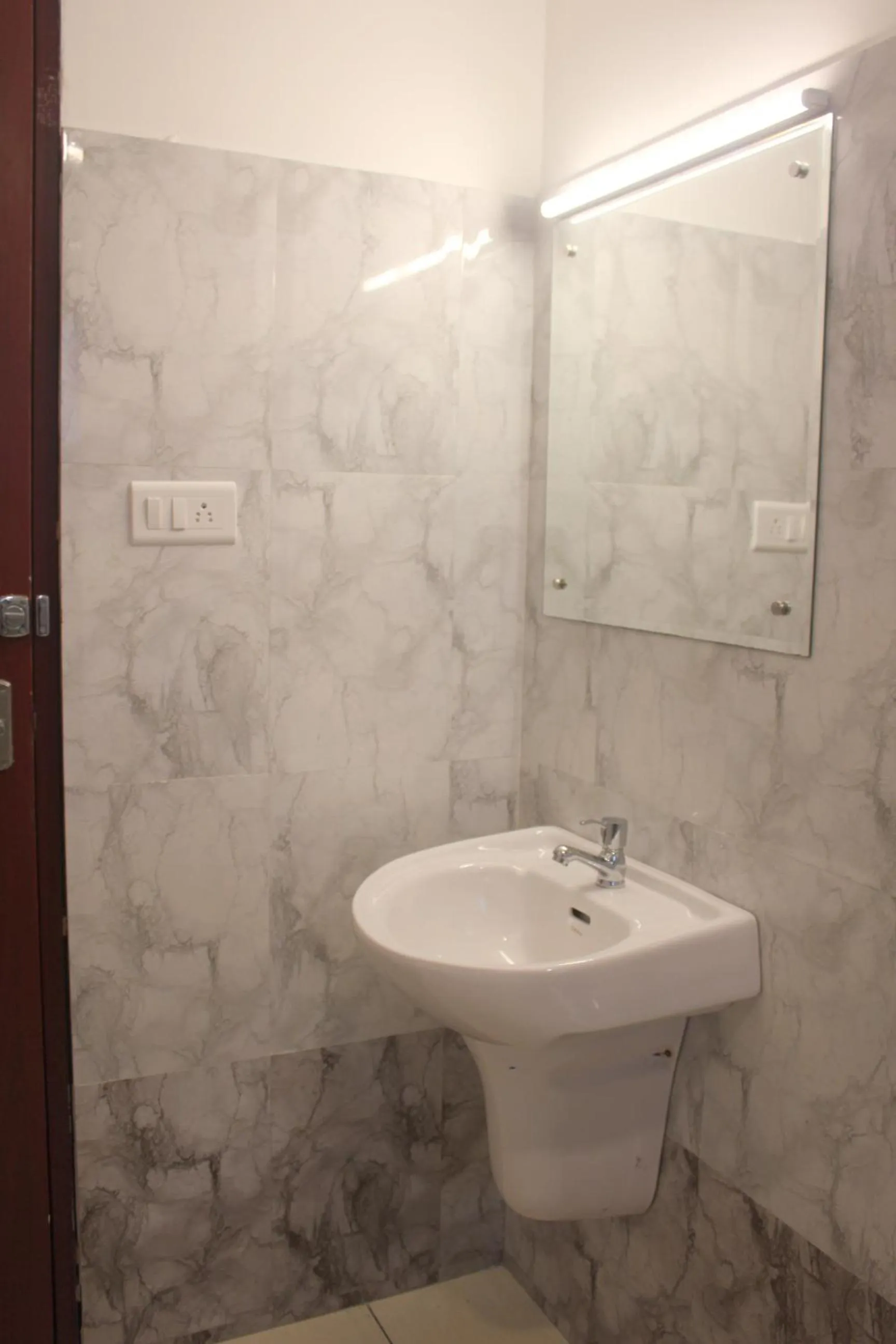 Bathroom in Aura Residency