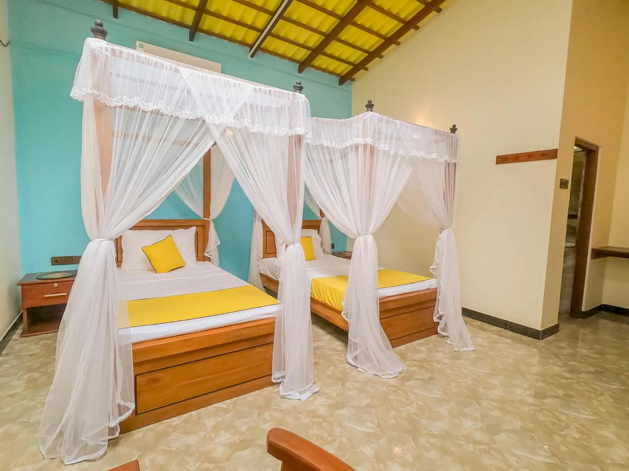 Bed in Terrace Garden Ayurveda Resort