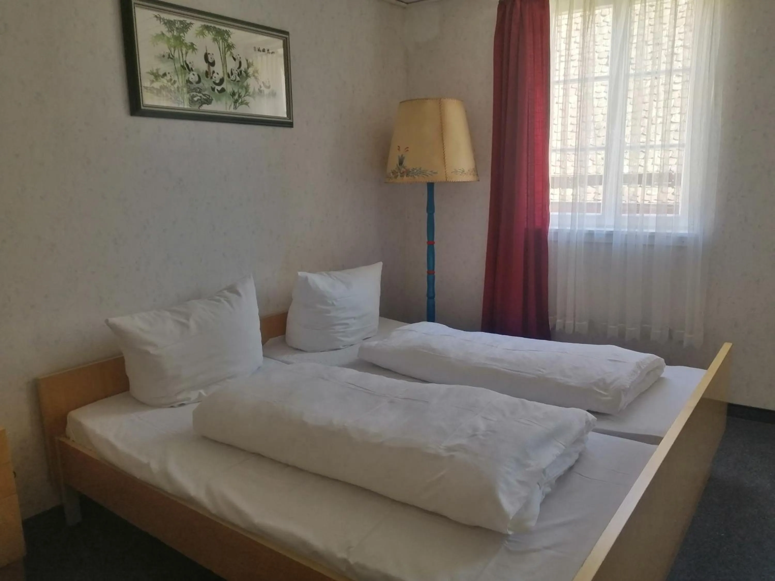 Bed in China Restaurant Hotel Lotus