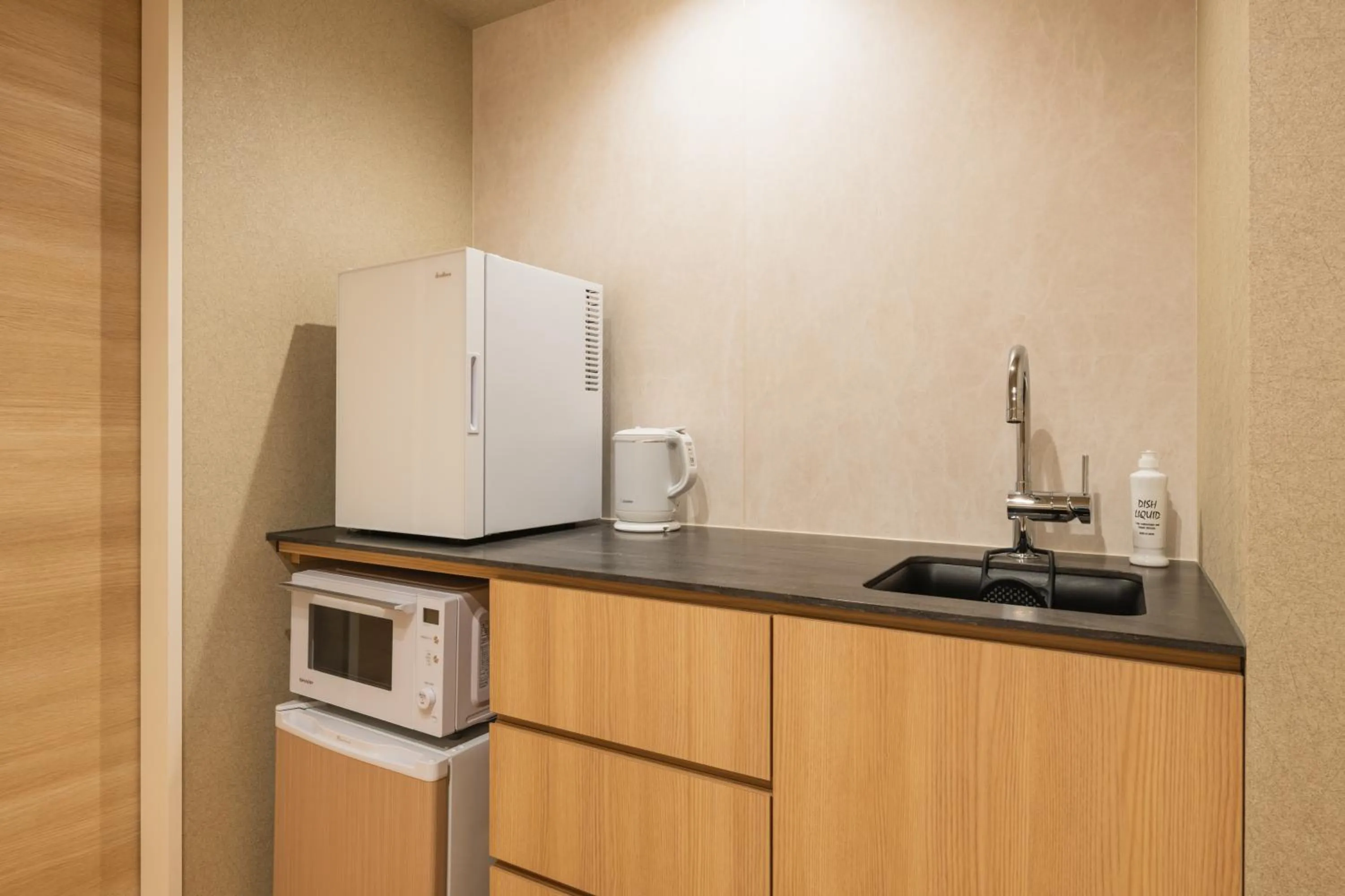 Kitchen or kitchenette in GRAND BASE Hakatamon