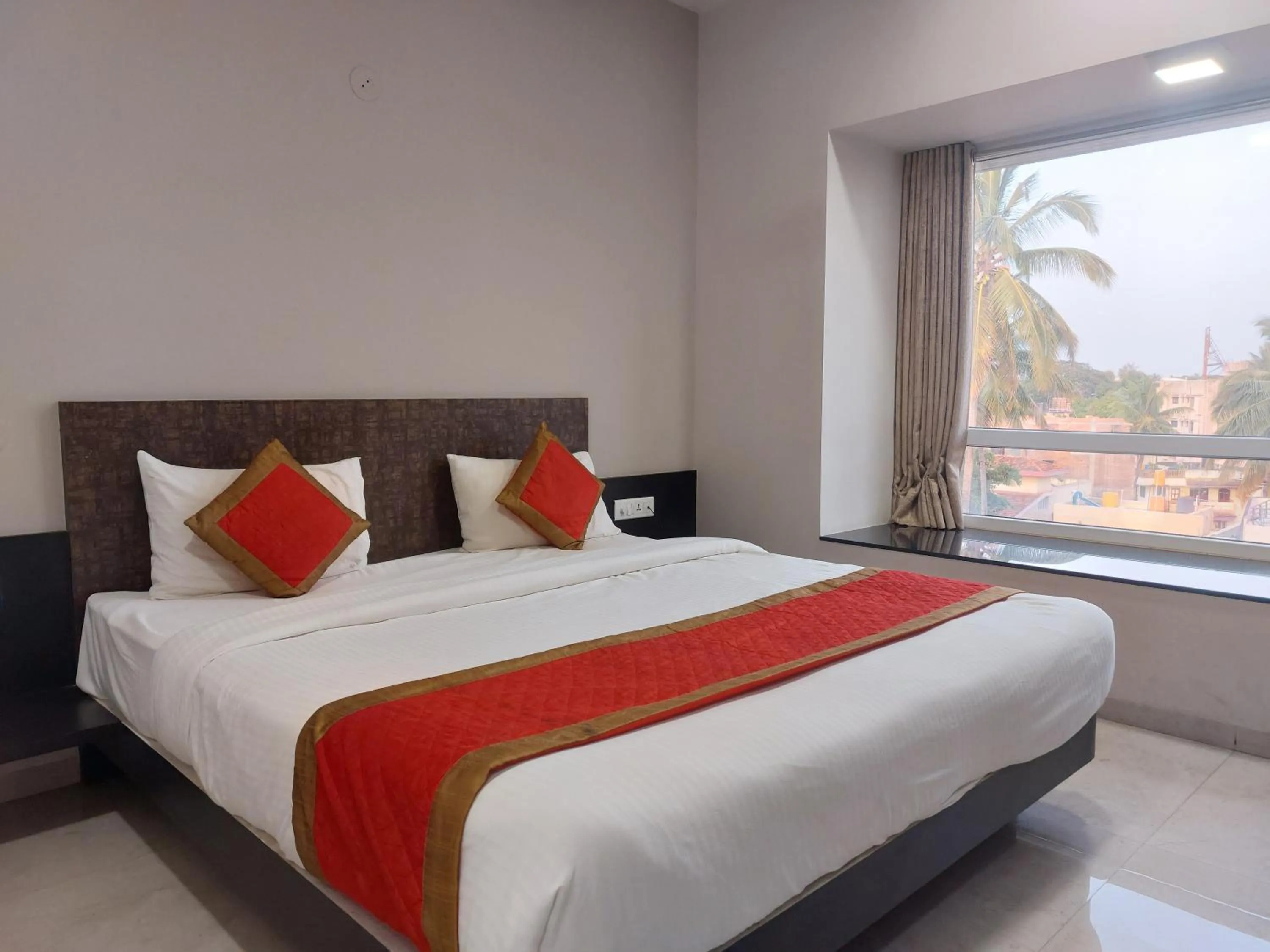 Bed in Hotel Rahul Palace Belgaum