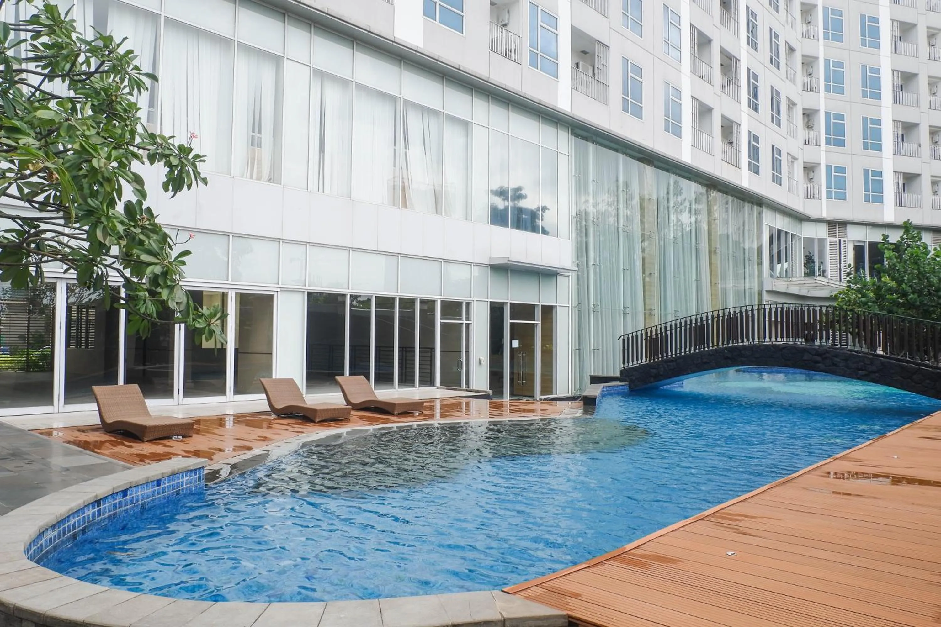 Property building in Lavish 2BR Apartment at Grand Sungkono Lagoon By Travelio