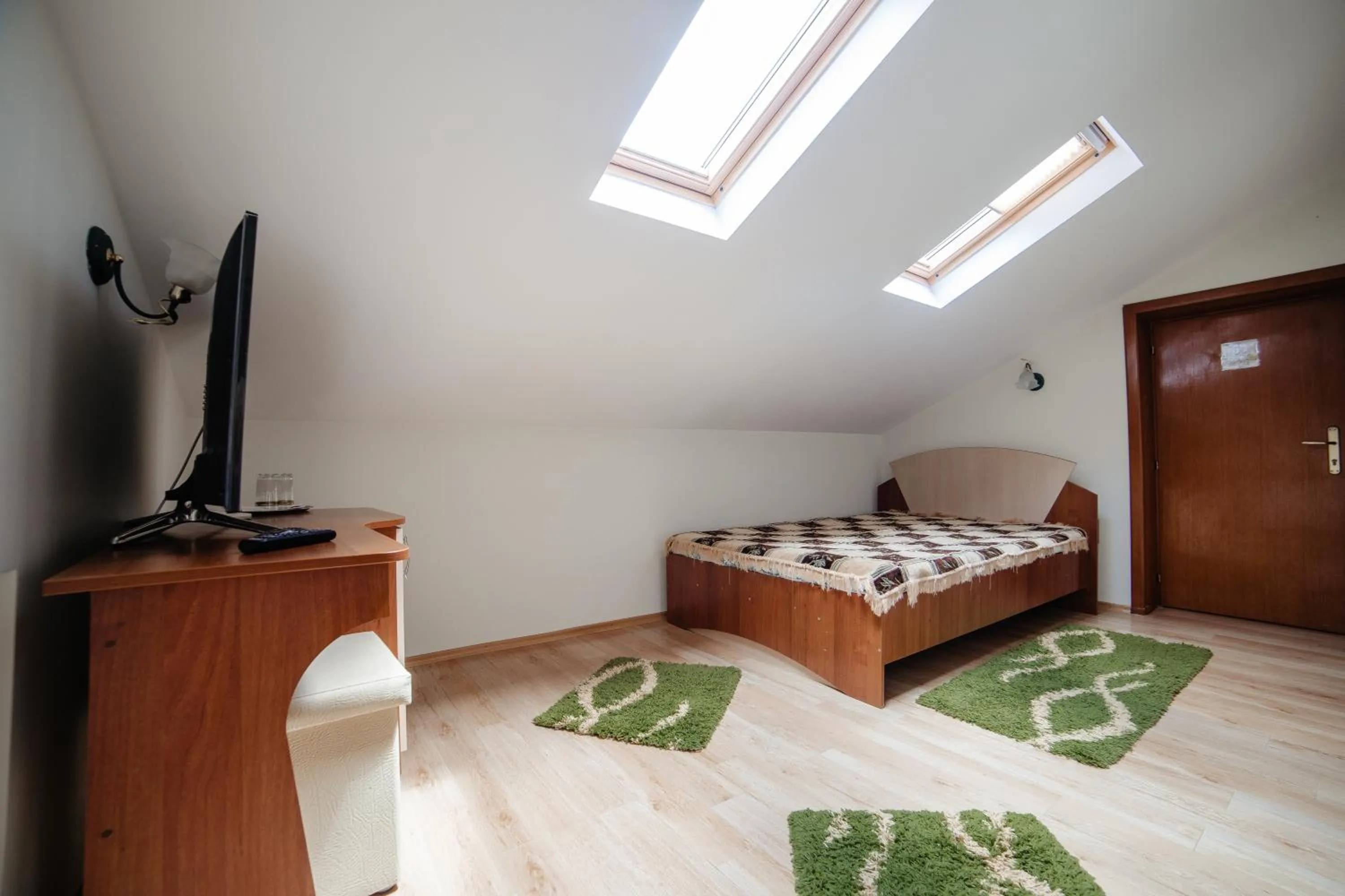 Bed in Pensiunea Floare de Colţ