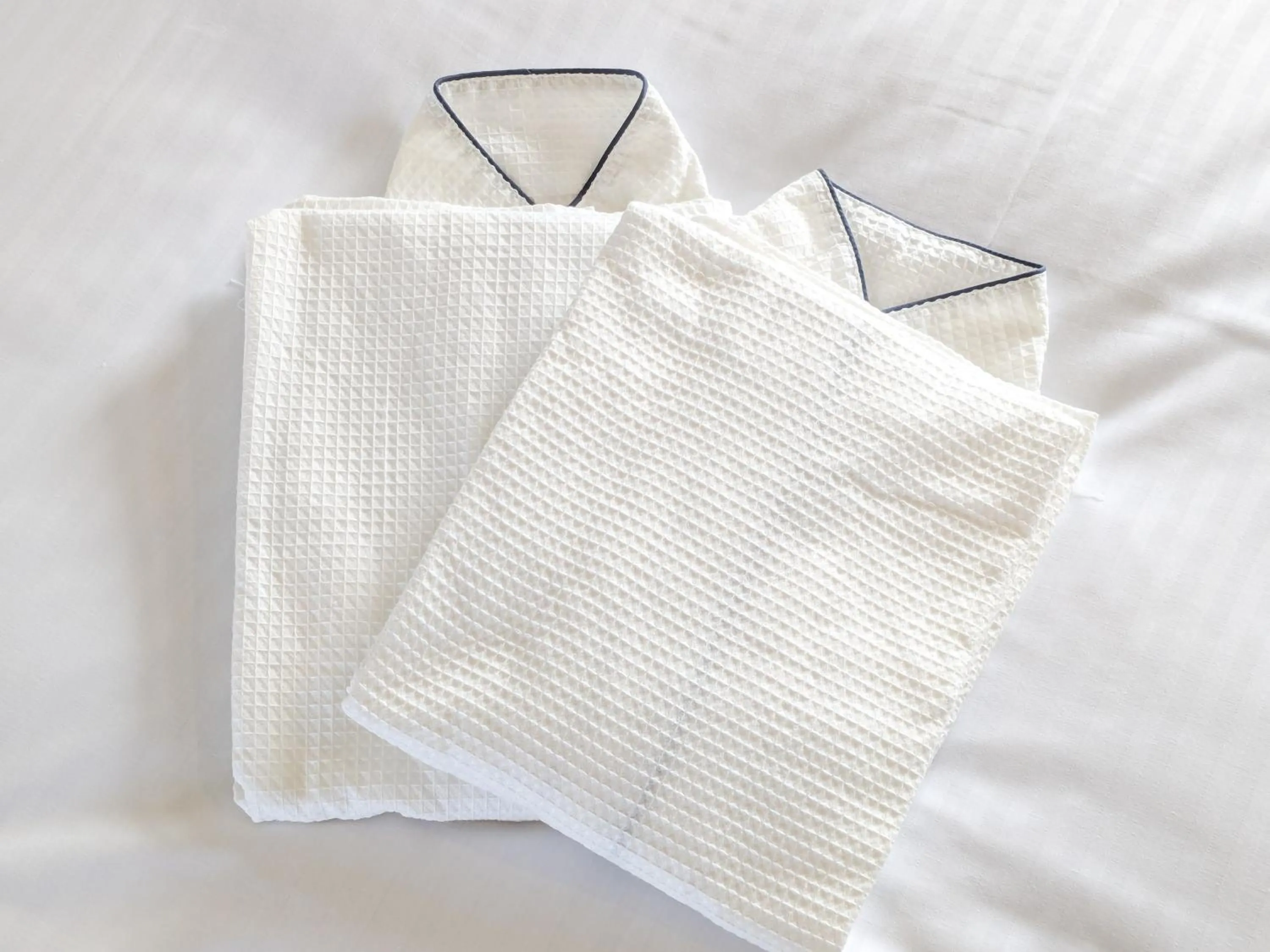 Bed in Odysis Onna Resort Hotel