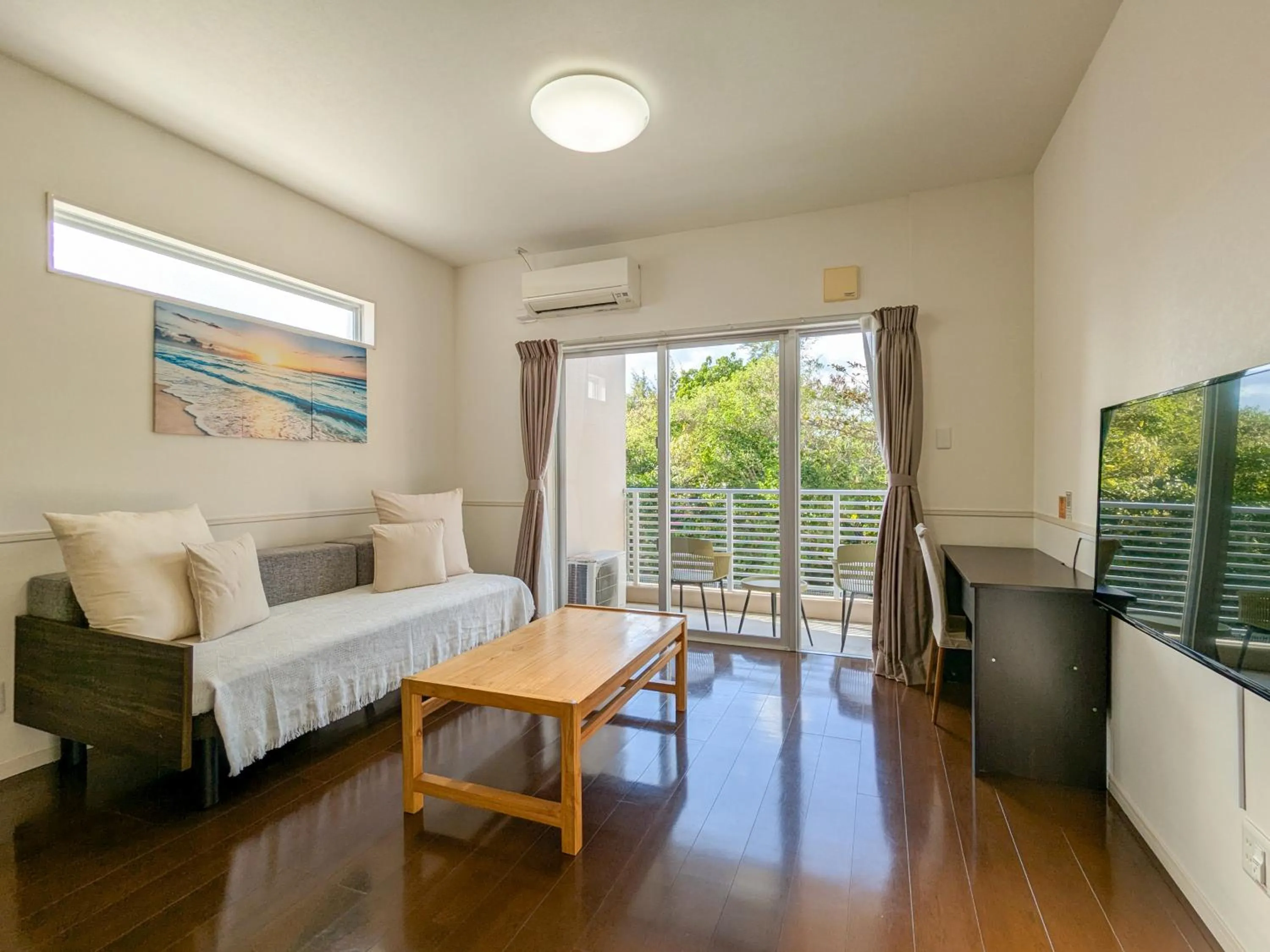 Bed in Odysis Onna Resort Hotel