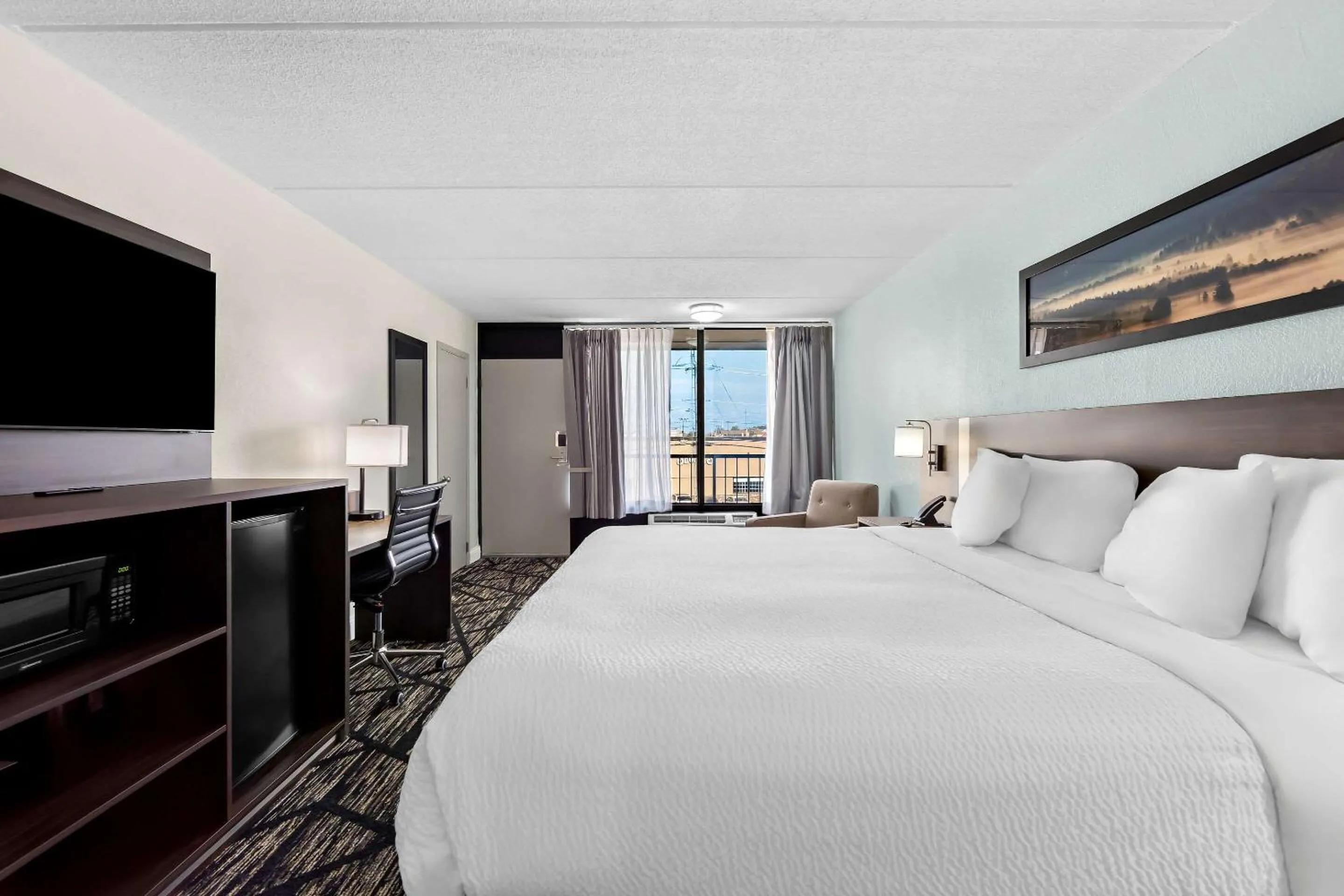 Bedroom, Bed in Days Inn & Suites by Wyndham Pigeon Forge