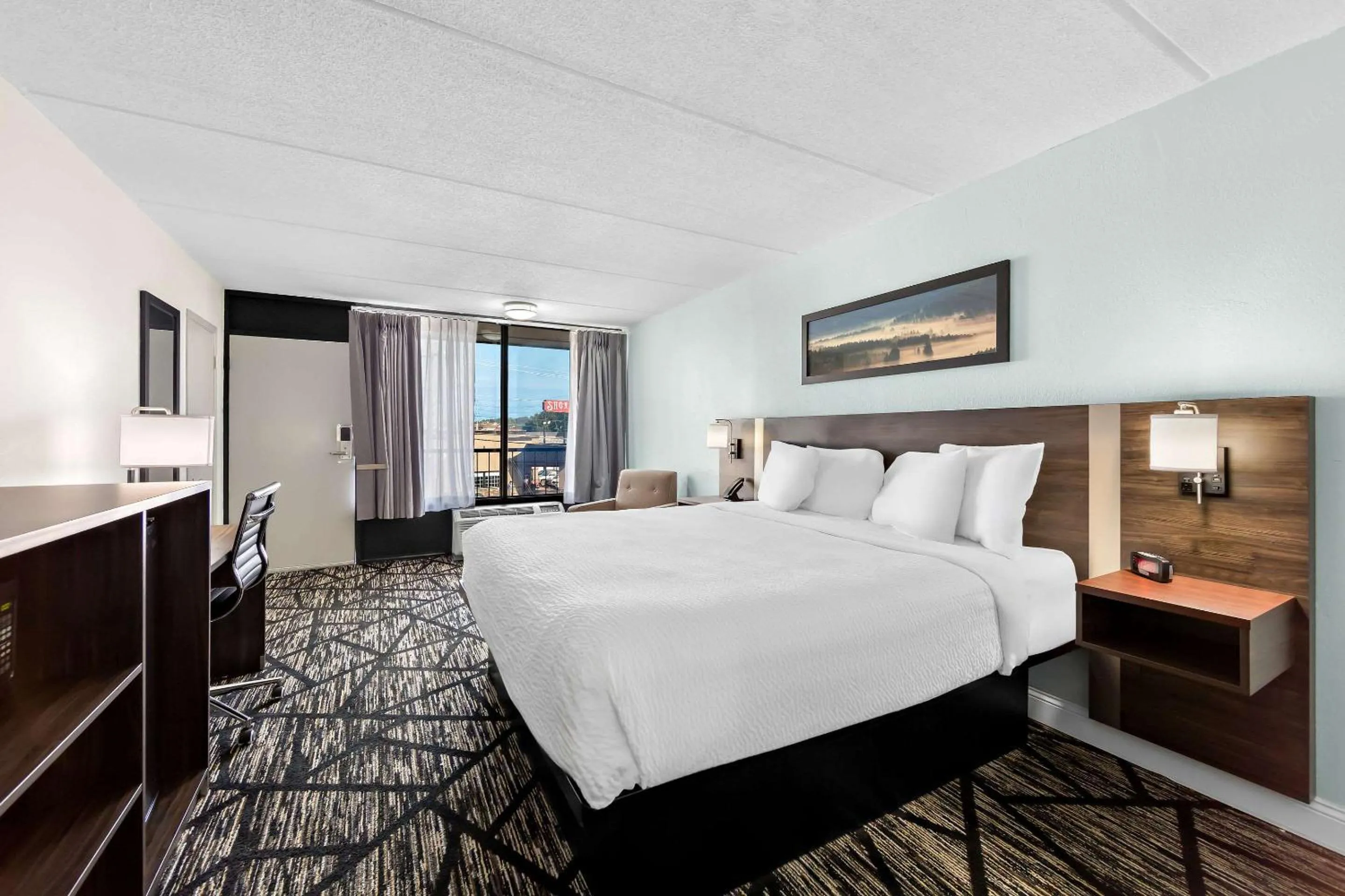 Bedroom, Bed in Days Inn & Suites by Wyndham Pigeon Forge