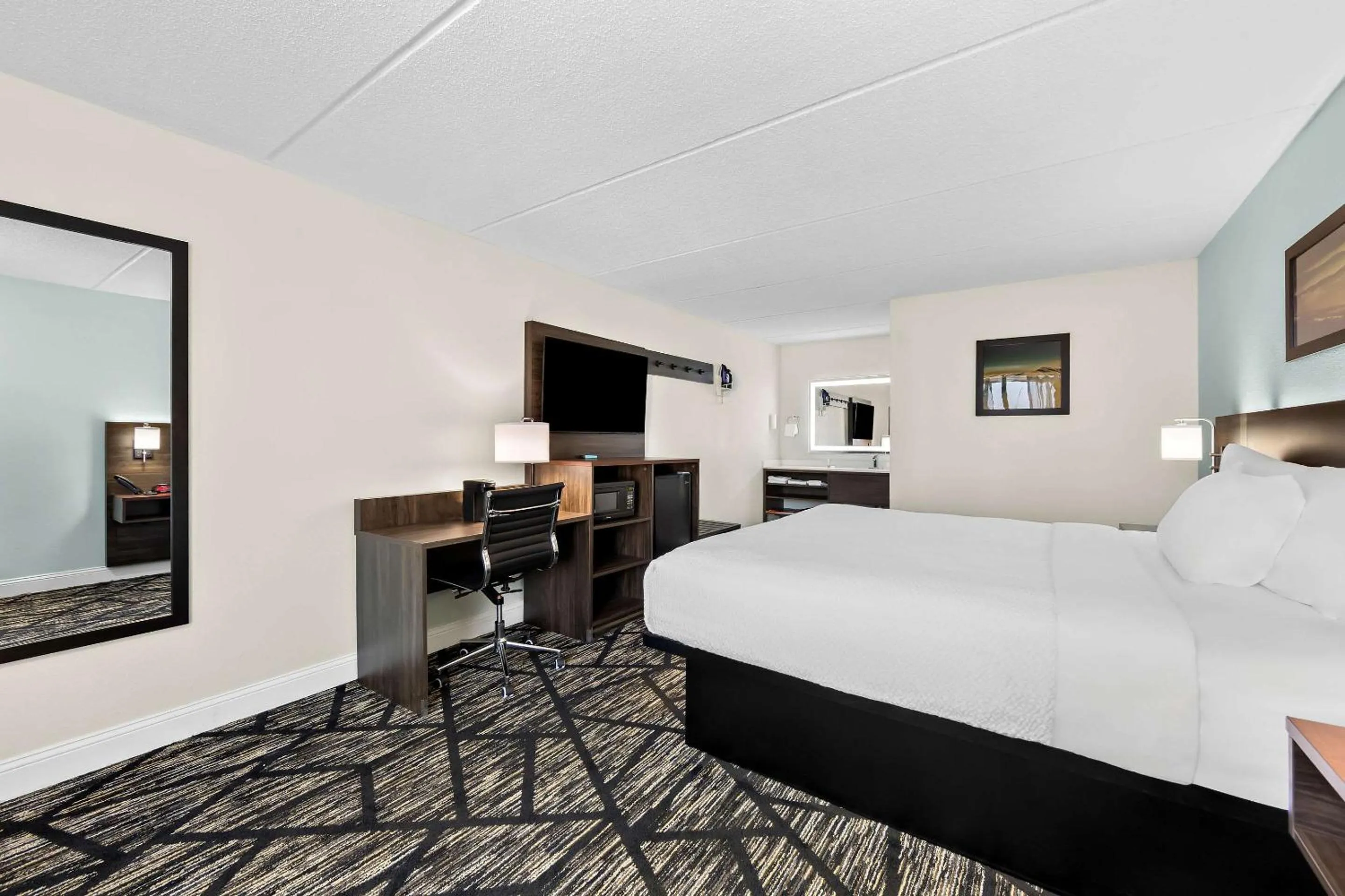 Bedroom, Bed in Days Inn & Suites by Wyndham Pigeon Forge