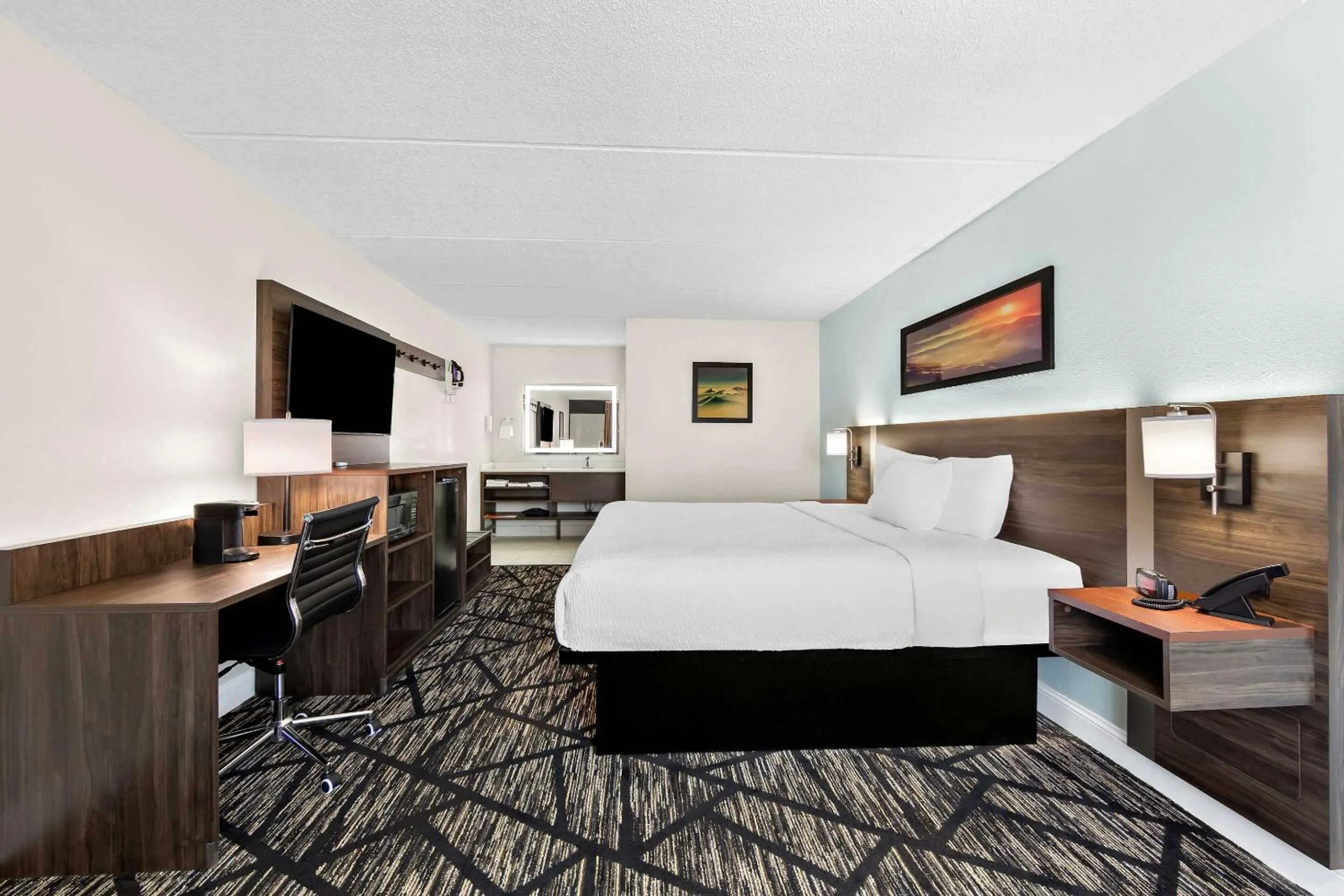 Bedroom, Bed in Days Inn & Suites by Wyndham Pigeon Forge