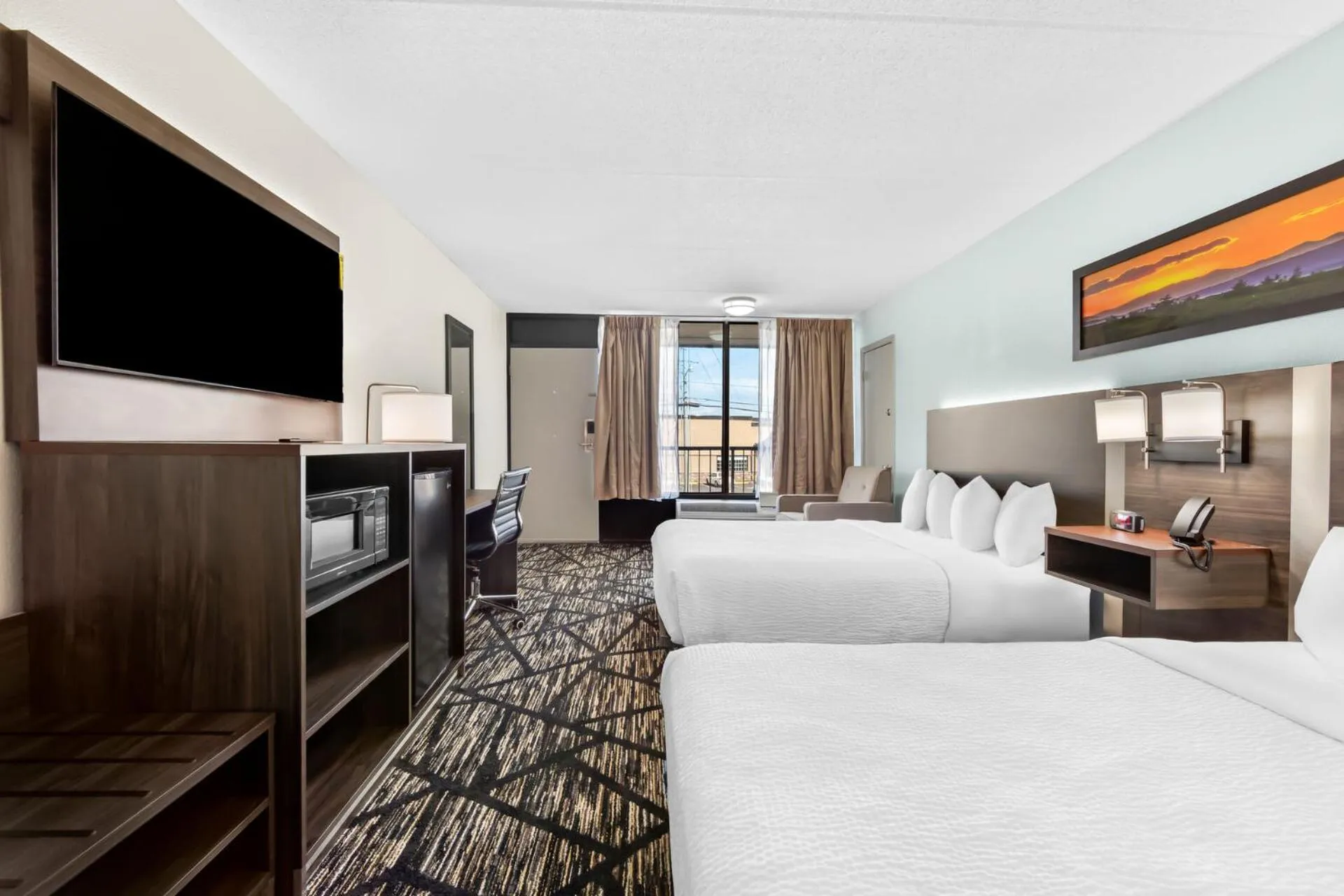 Bed in Days Inn & Suites by Wyndham Pigeon Forge