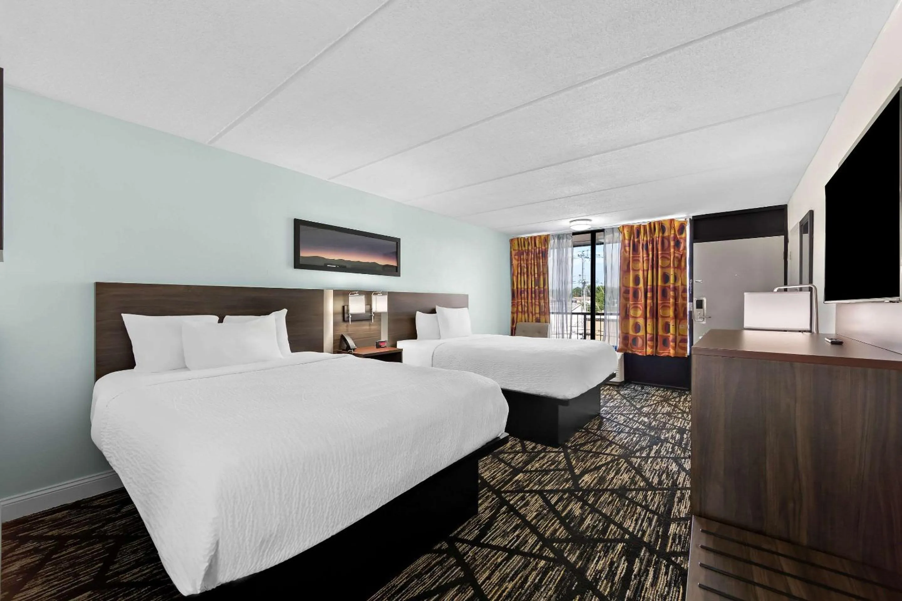 Bedroom, Bed in Days Inn & Suites by Wyndham Pigeon Forge