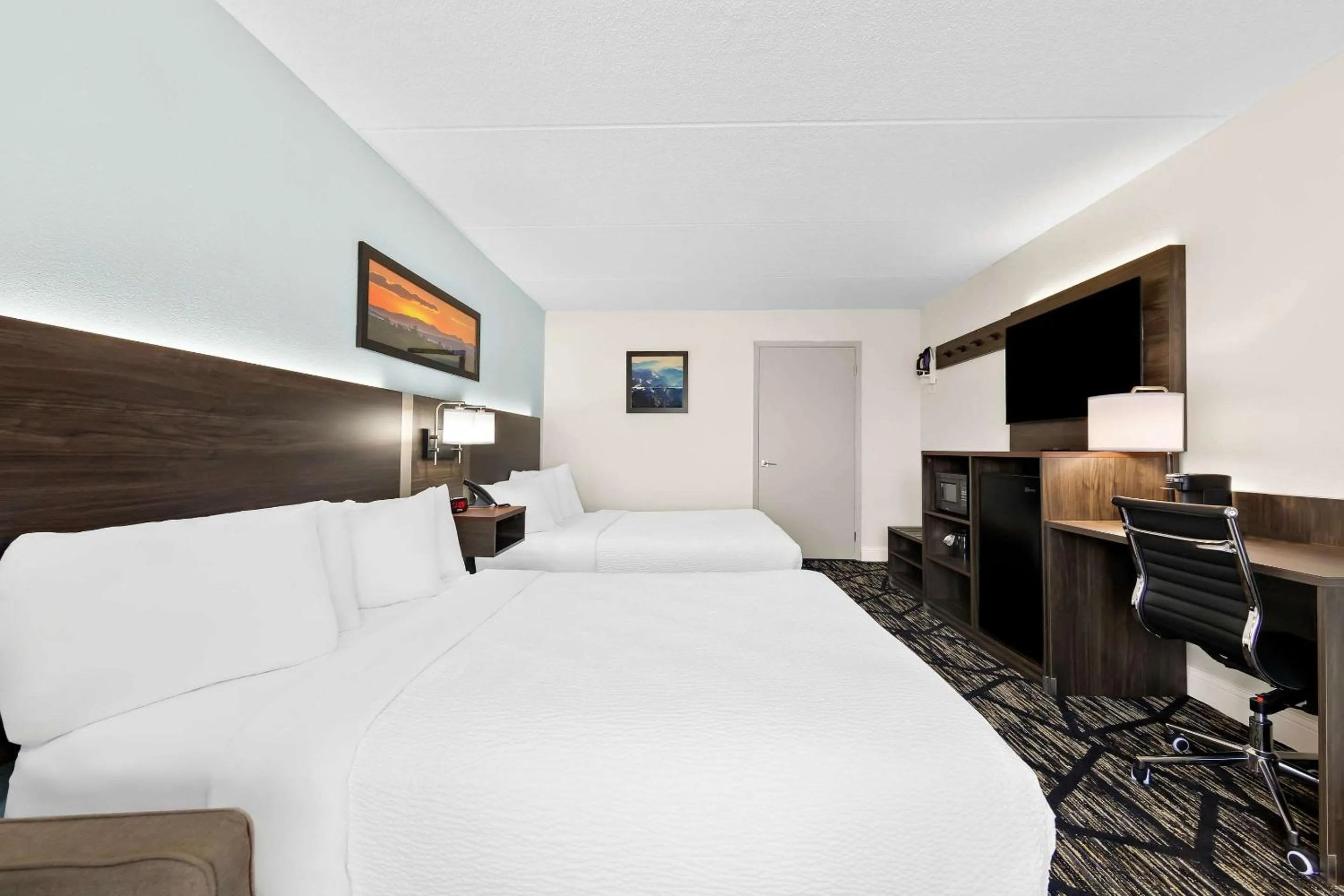 Bedroom, Bed in Days Inn & Suites by Wyndham Pigeon Forge