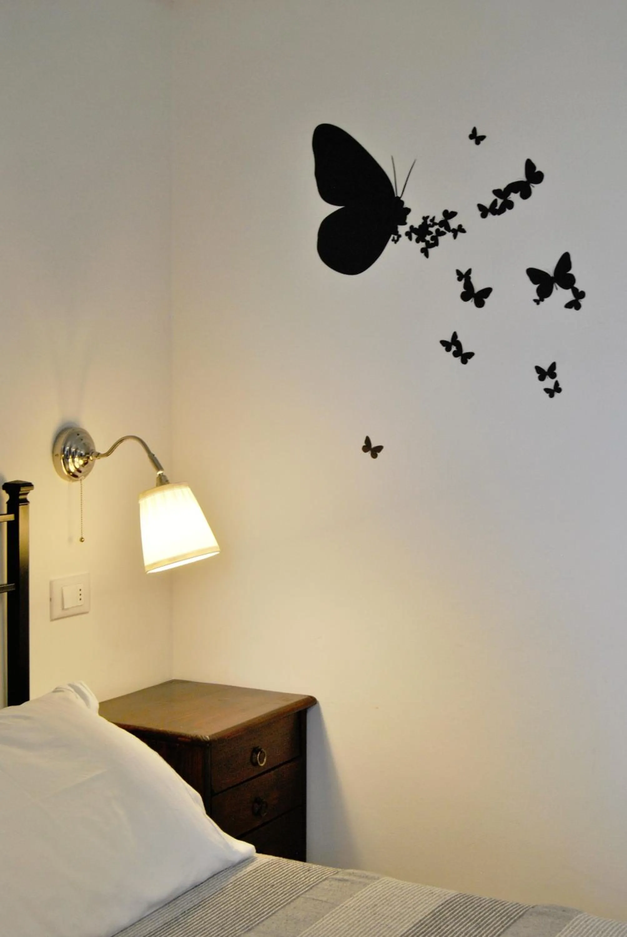 Decorative detail, Bed in Le Bassotte b&b