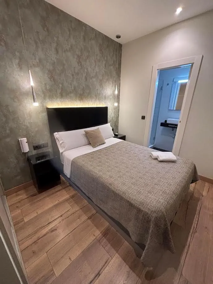 Bed in DAOS Suites & Terrace Marbella