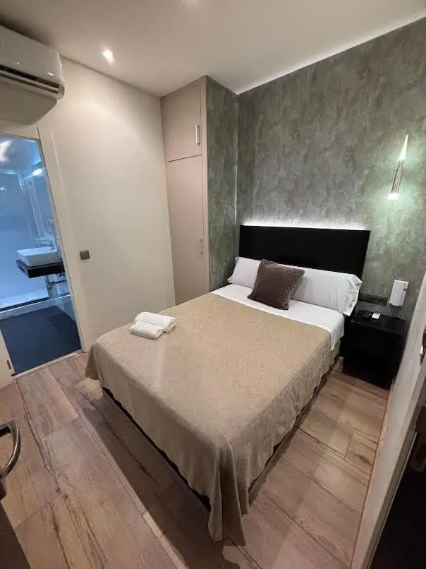 Bed in DAOS Suites & Terrace Marbella