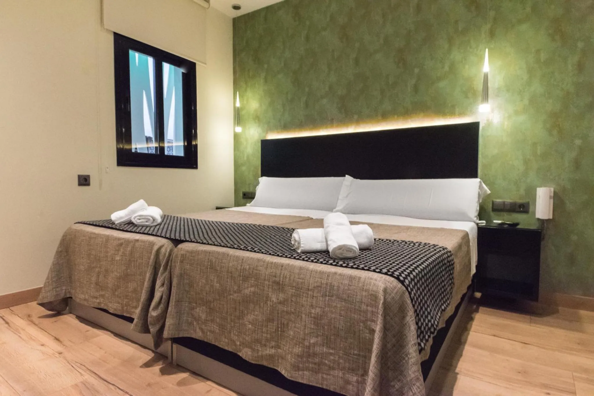 Bed in DAOS Suites & Terrace Marbella