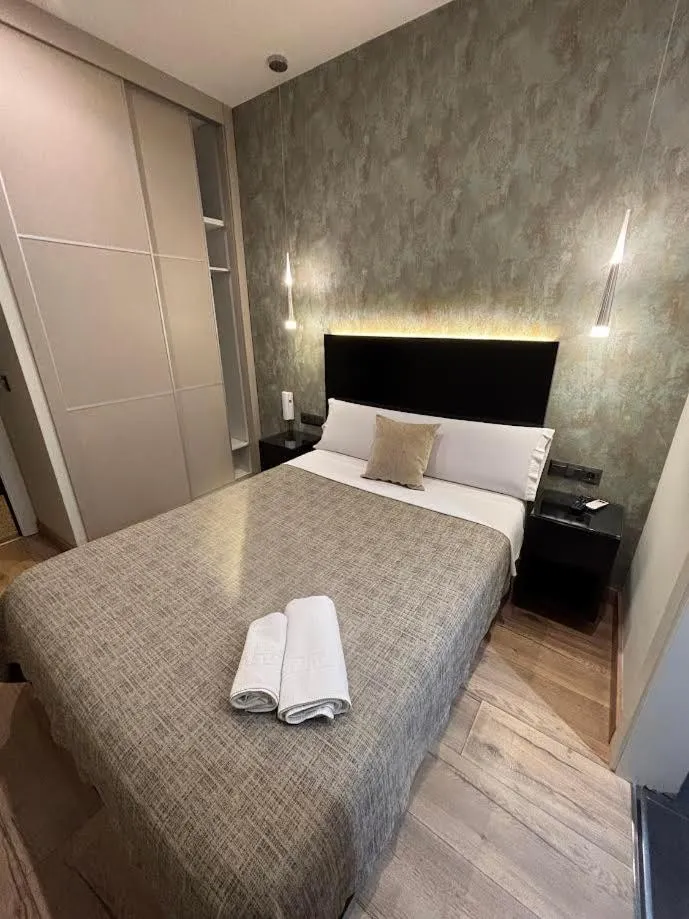 Bed in DAOS Suites & Terrace Marbella