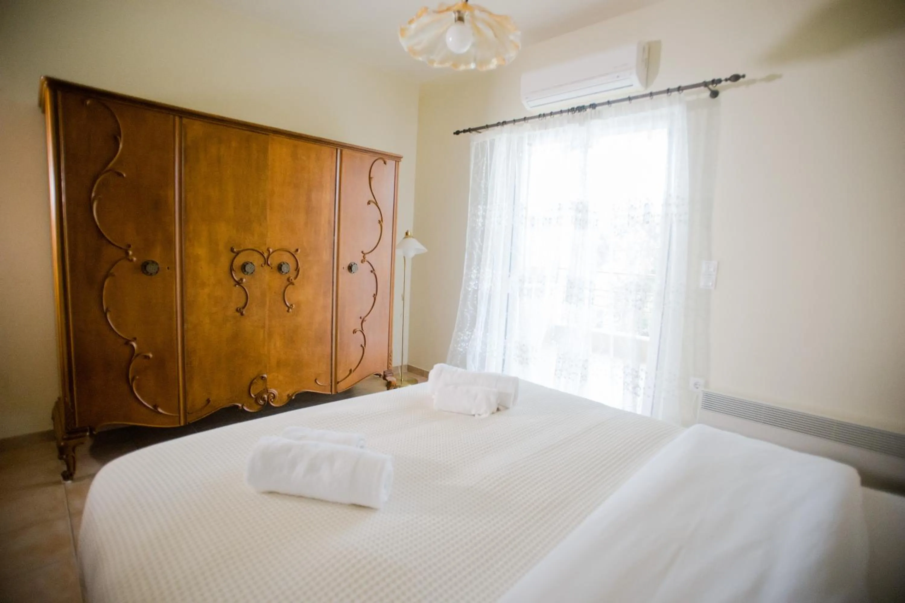 Bedroom, Bed in PLEIADES lUXURY APARTMENTS