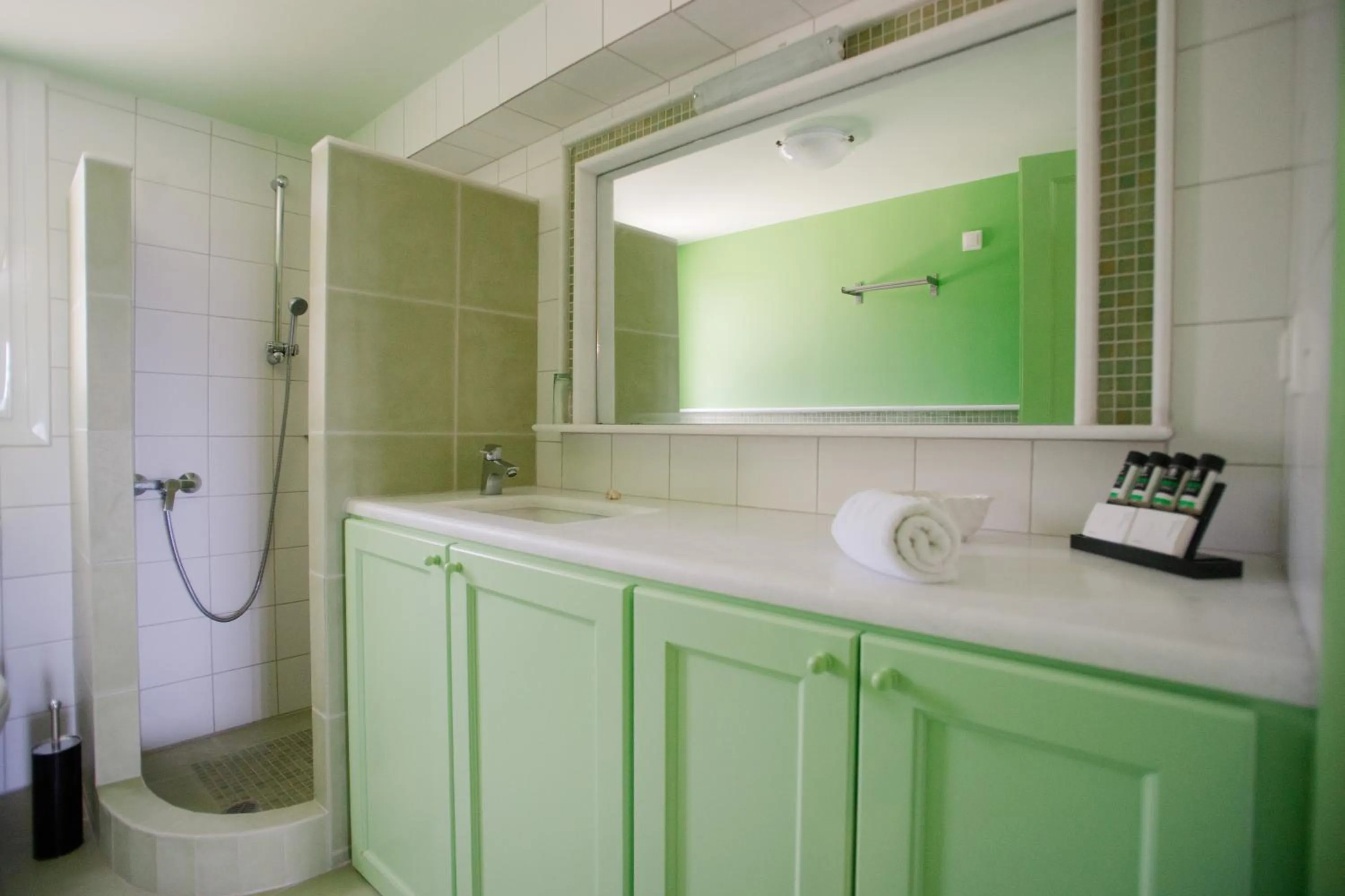 Shower in PLEIADES lUXURY APARTMENTS