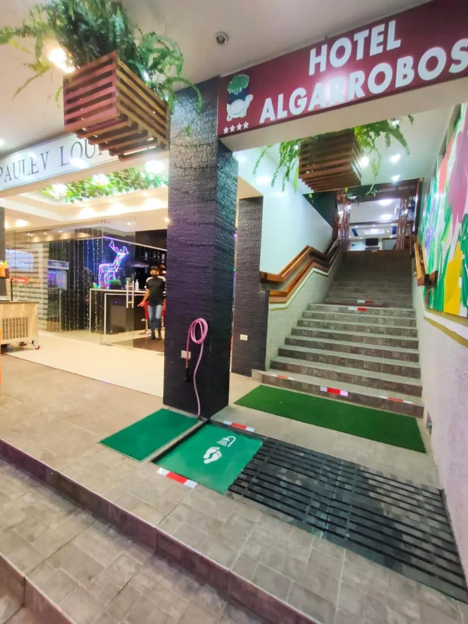 Property logo or sign in Hotel Los Algarrobos