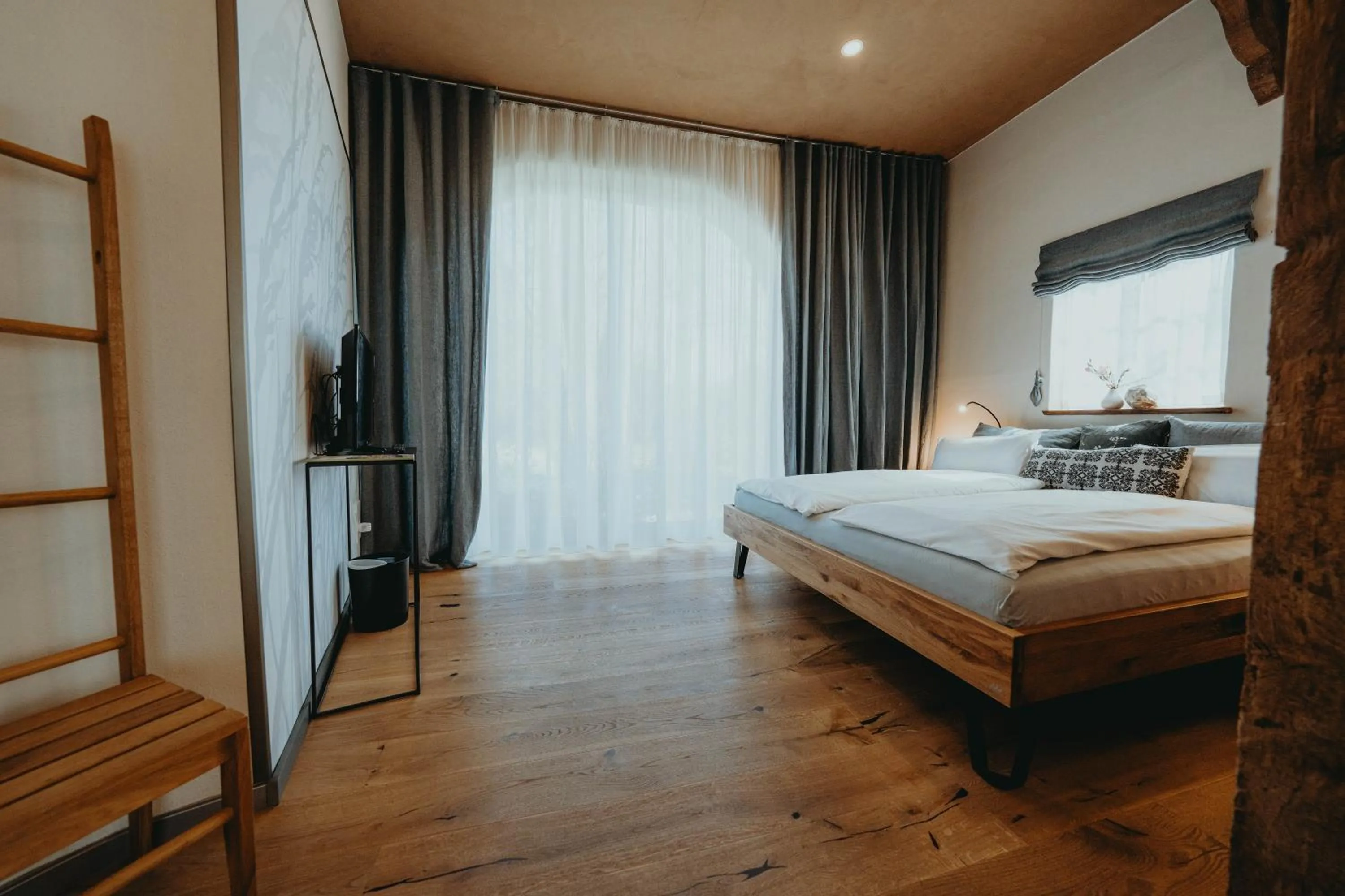 Photo of the whole room, Bed in Biohotel WildLand Natural Resort