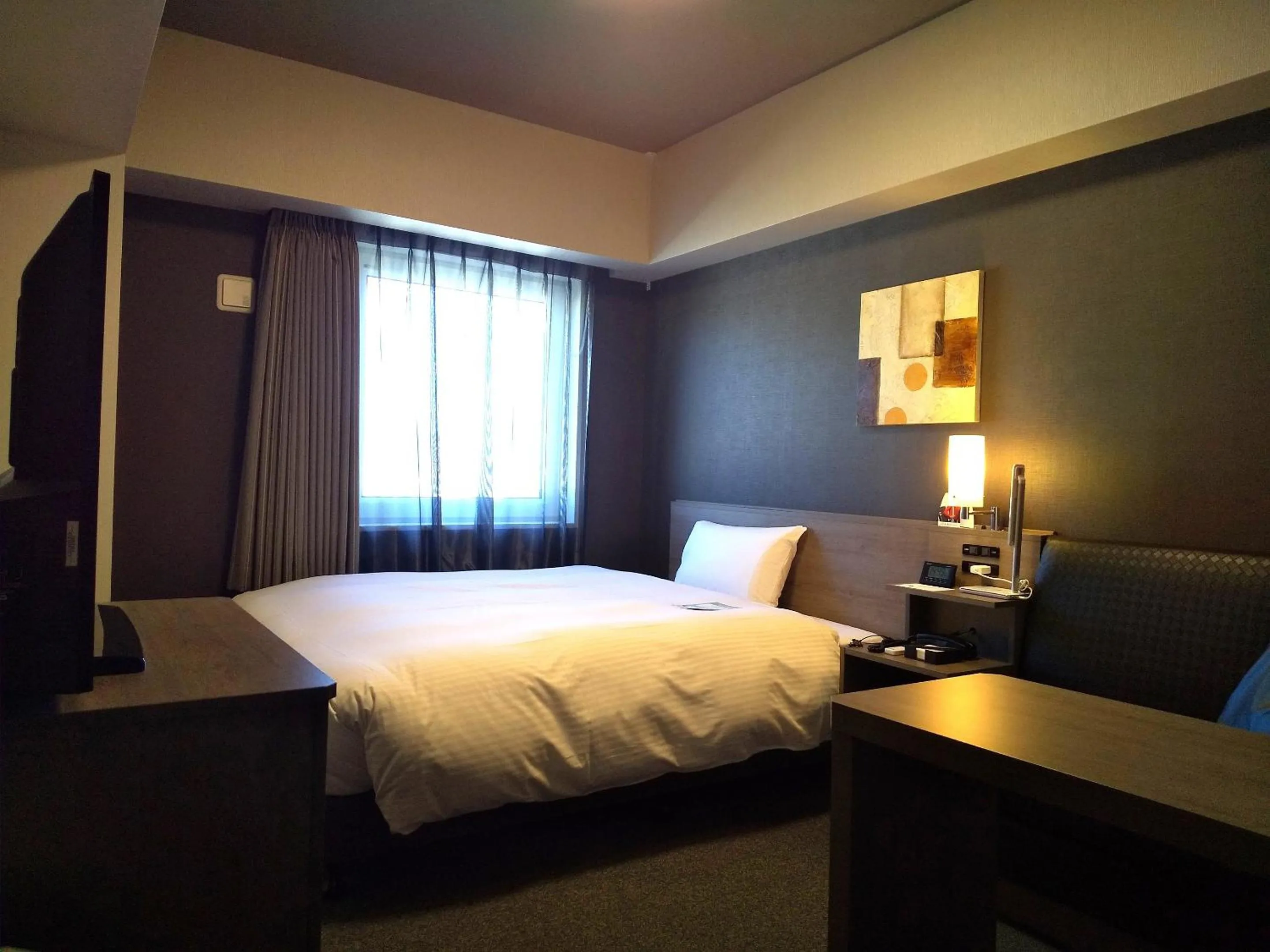 Photo of the whole room, Bed in Hotel Route-Inn Mihara Ekimae