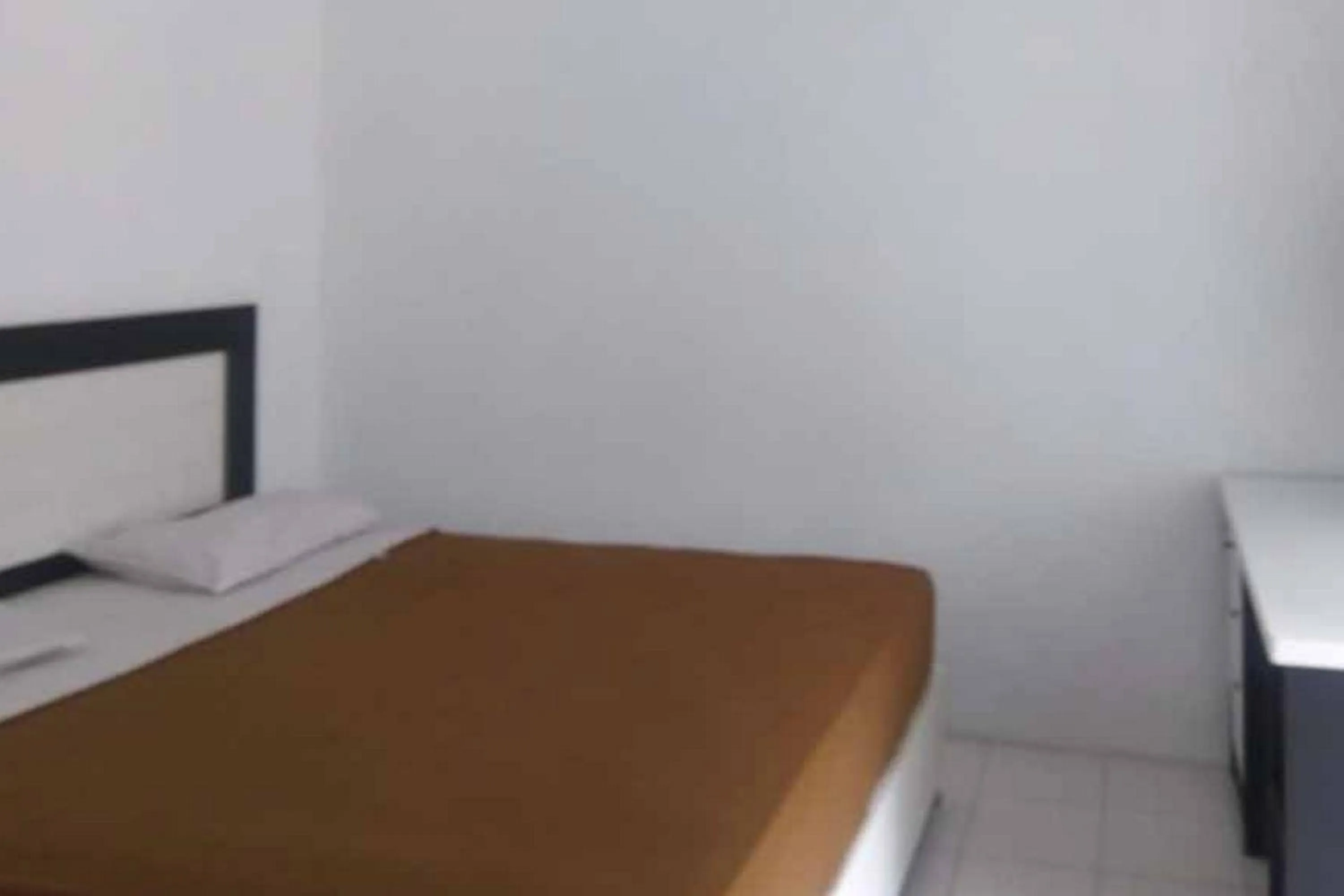 Bed in RedDoorz Syariah @ Hotel Kencana Tasikmalaya