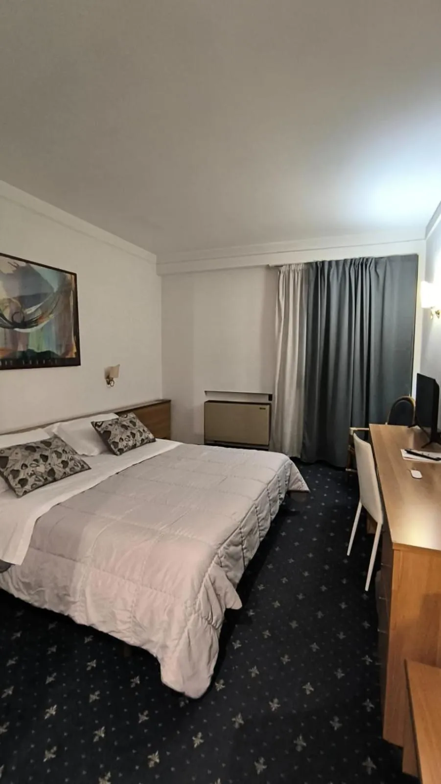 Bed in HOTEL QUADRIFOGLIO