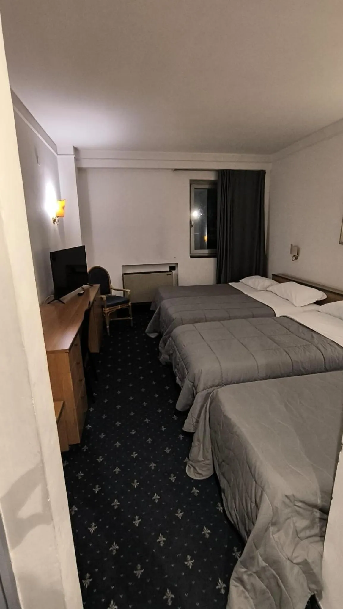 Bed in HOTEL QUADRIFOGLIO