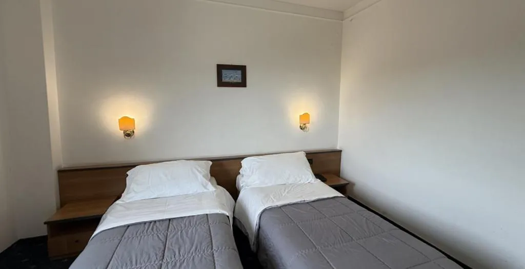 Bed in HOTEL QUADRIFOGLIO