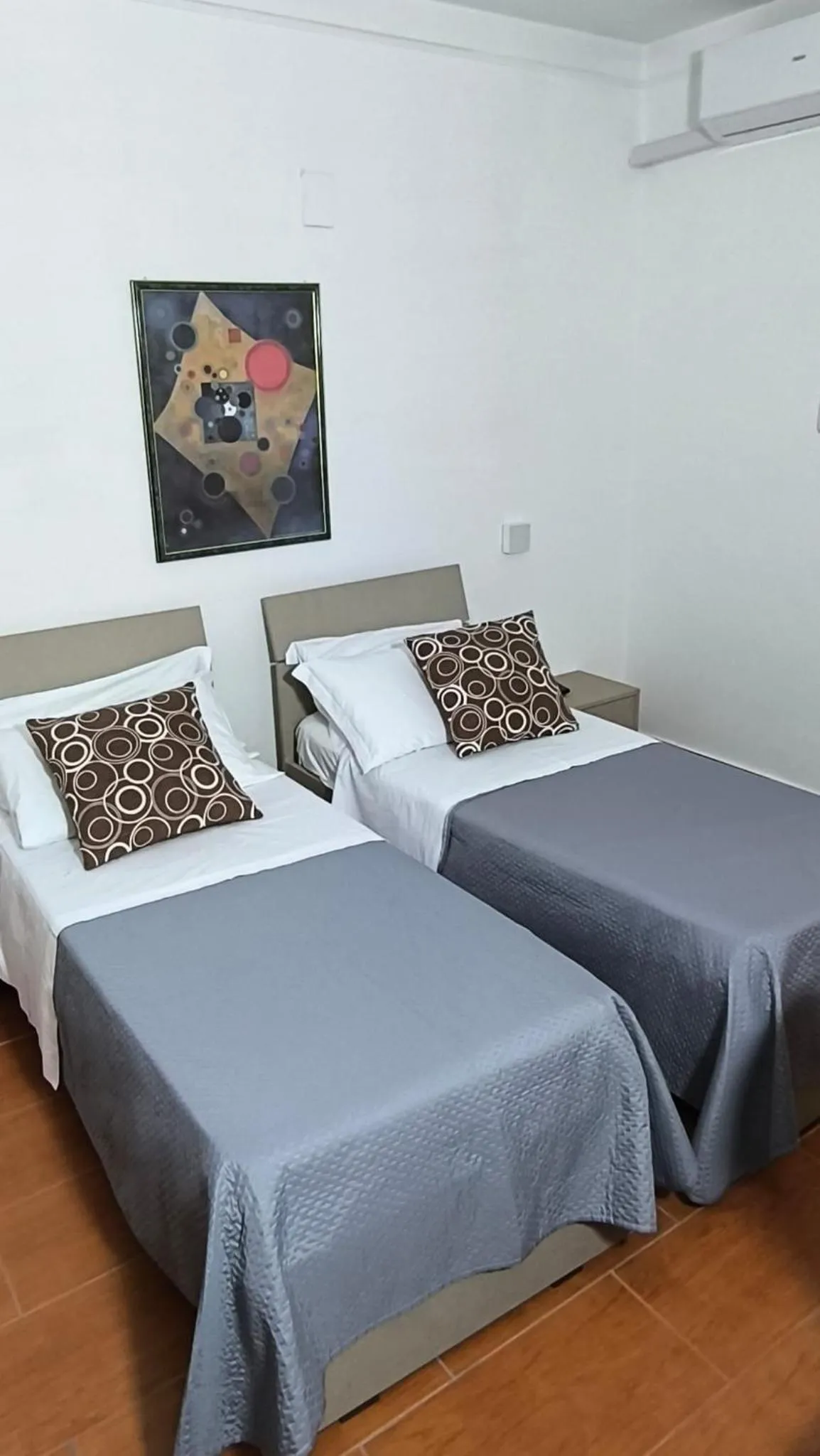 Bed in HOTEL QUADRIFOGLIO