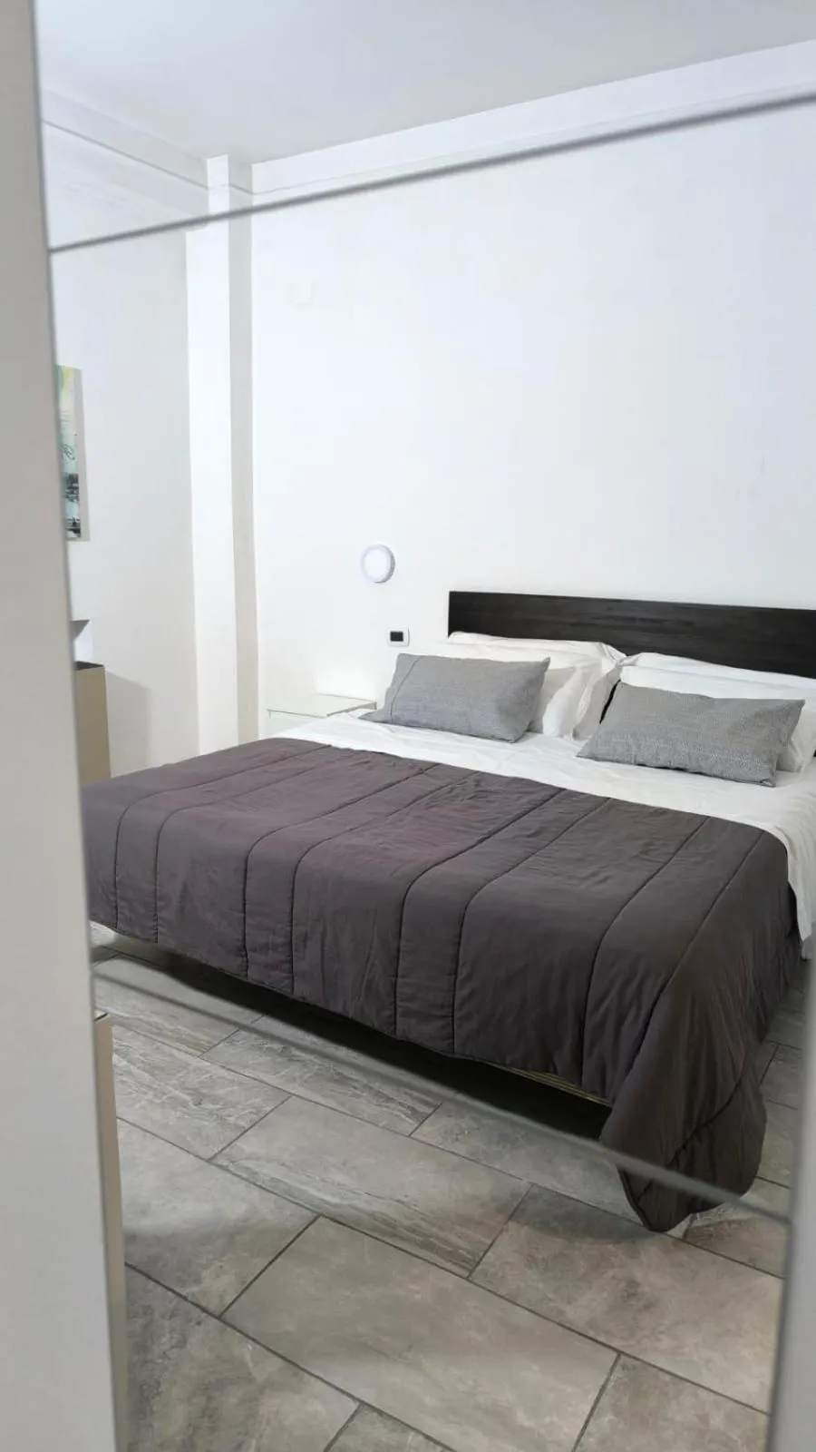 Bed in HOTEL QUADRIFOGLIO