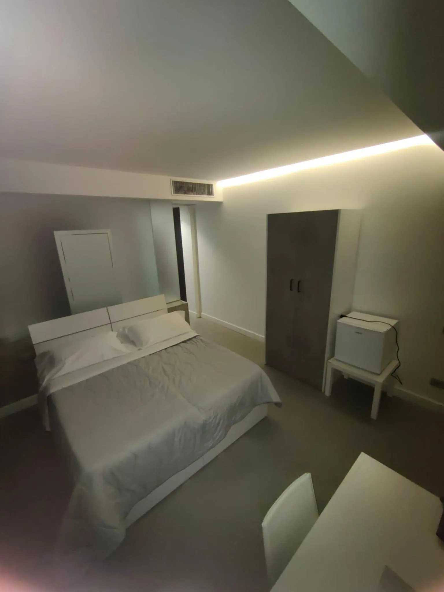 Bed in HOTEL QUADRIFOGLIO