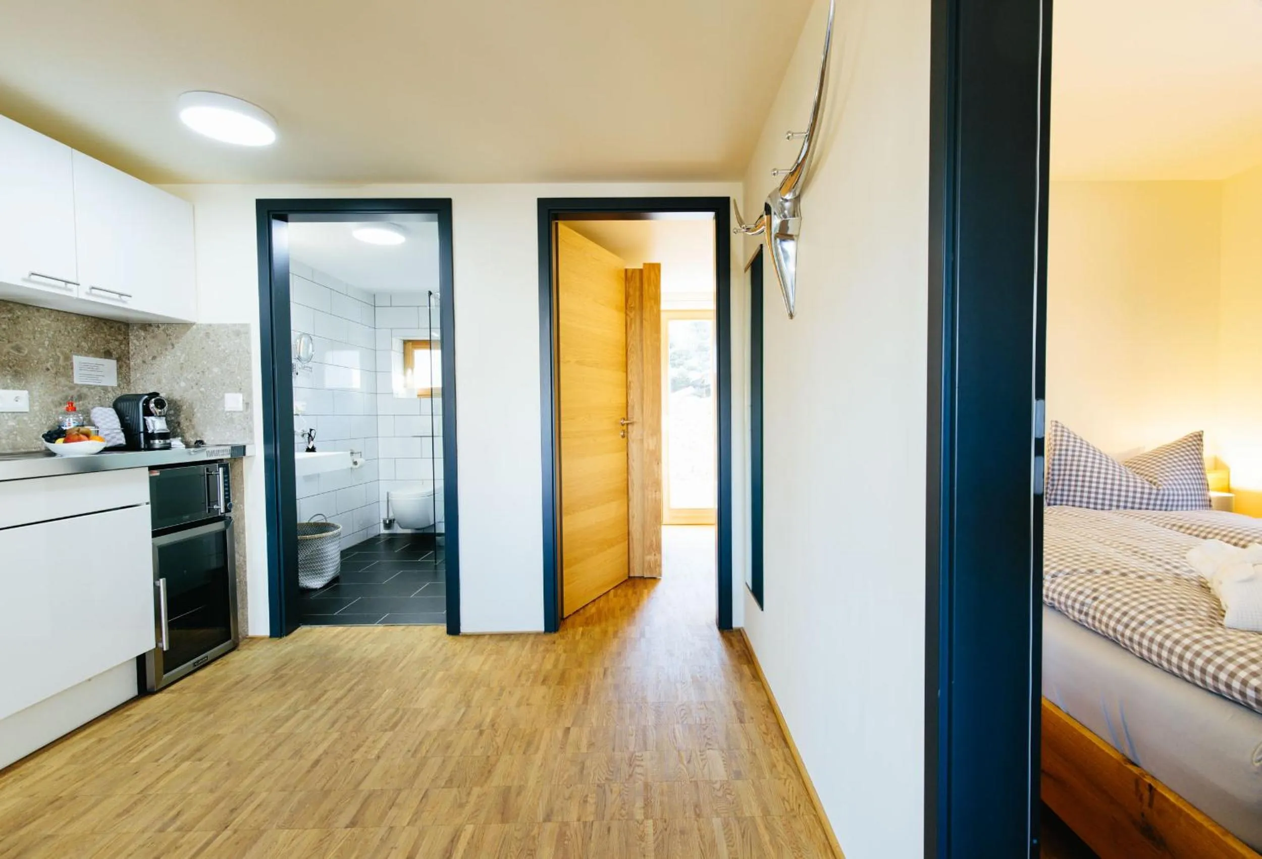 Bathroom, Bed in Apartmenthotel Oberstdorf